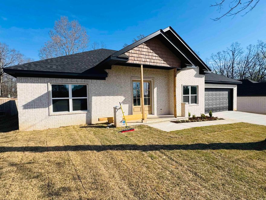 Affordable New Construction. High end finishes throughout. Custom trim and crown molding throughout. Stainless appliances. Custom built cabinets. Formal dining/office can be used as a 4th bedroom. Electric fireplace. Sun room that opens up to the covered back patio. Custom tile in both bathrooms. No fiberglass inserts! LVP flooring throughout. No carpet! Massive lot in the back of a quiet cul de sac.