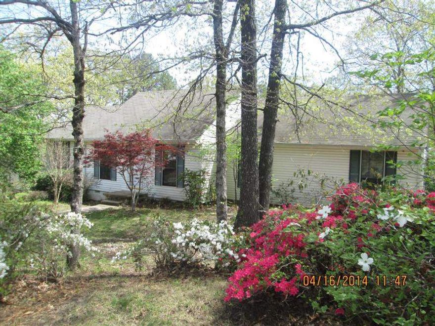 Property sold AS-IS, no disclosures or warranties. Proof of funds or pre-approval letter required with all offers. Earnest money required and must be in the form of a cashiers check. Agents see confidential remarks for showing instructions and additional information.  5BR/3BA home with large living room w/fireplace, dining room, master suite on main level, enclosed garage consists of 2 of the bedrooms, walk-out basement level has 2BR/1BA & 2nd living area.  Nice covered deck in fenced back yard.