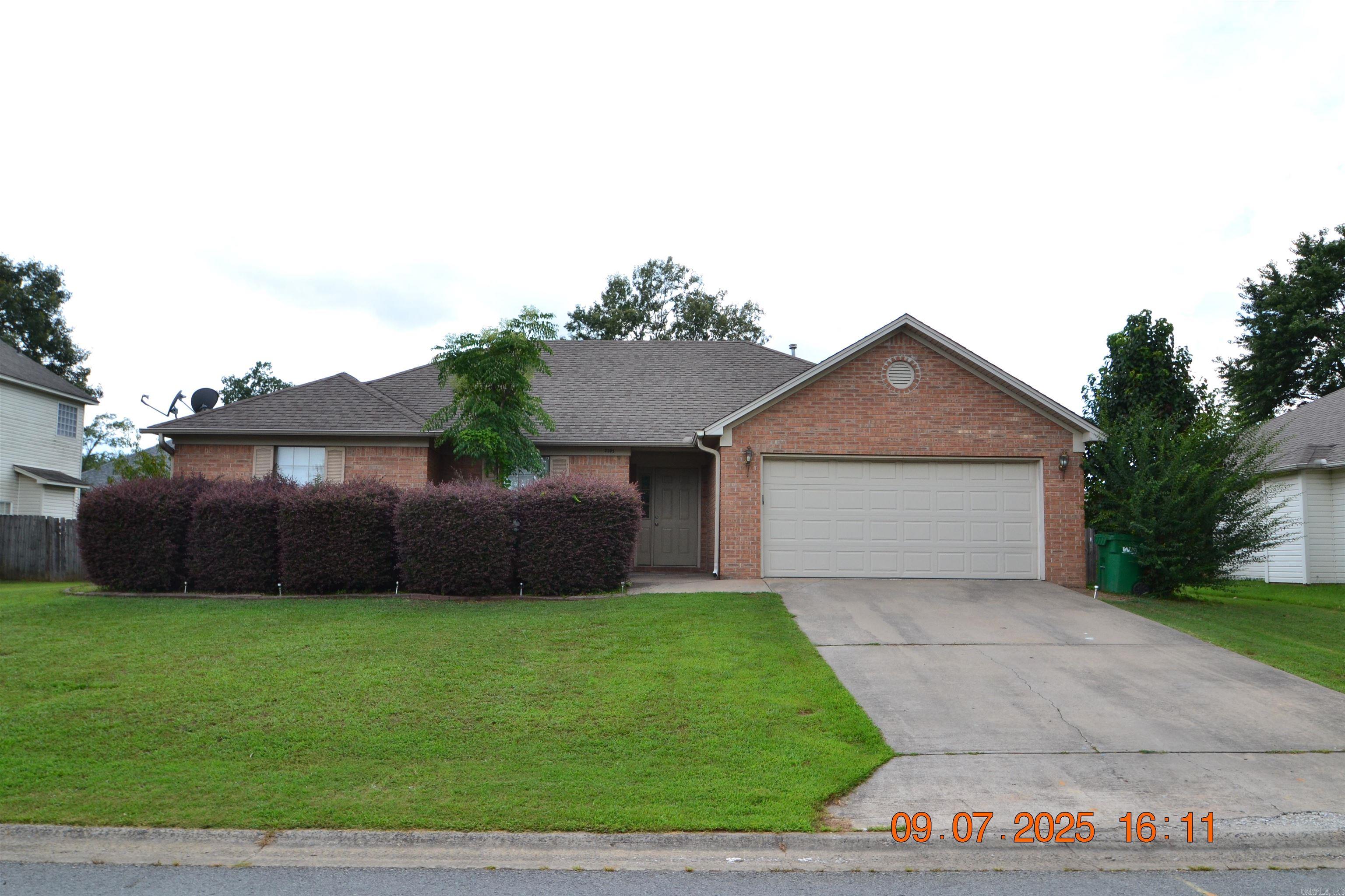Come take a look at this lovely home located close to schools, shopping and major highways. Neutral colors in this open floorplan. Great room has gas log fireplace & vaulted ceiling. A breakfast area adjoins the large kitchen with beautiful cabinetry, an island & refrigerator stays. The laundry room, pantry & closet are off the hallway leading to the garage. The primary suite has a tray ceiling & fan with adjoining bath. Enjoy the large jetted tub, separate shower, mirror, vanity & walk in closet. Two additional bedrooms have ample closets. The fenced backyard is level with a patio and a peach tree (with peaches on it!!!). Hurry before this one is snatched up by someone else.....