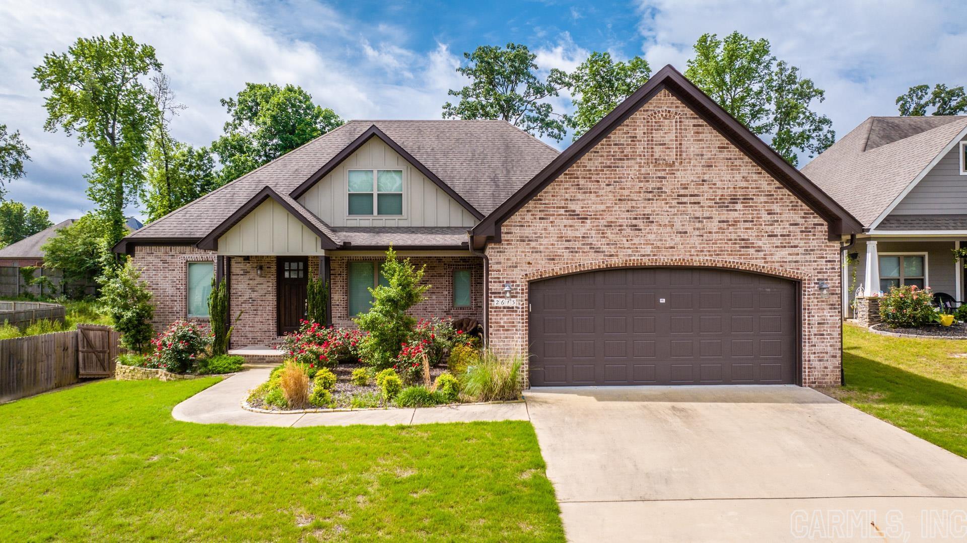 LOCATION LOCATION LOCATION! This spacious Bryant home is conveniently located to the interstate and all the shopping amenities you desire! Harper's Landing is one of the areas hottest subdivisions and now you have an opportunity to be a part of this kid friendly and beautiful neighborhood! This split plan spacious property is a showstopper!! Enjoy the jack n jill bathroom setup for the spare bedrooms on the main. Gorgeous hardwoods span the primary areas and master suite, including the open concept kitchen/living/dining, and light filled breakfast nook! Have your morning coffee or read a good book in your fully enclosed sunroom w/mini-split and fireplace to enjoy for all seasons! Upstairs is a well-appointed guest suite or in-law quarters, complete with full bathroom, spacious closet, and oversized bedroom! The fully fenced lush yard even has a playset for the kiddos! The two-car garage is equipped with a storm saferoom as well. Let the extra landscaping welcome you as you walk up and explore all this Bryant home has to offer and hurry to make it your own!
