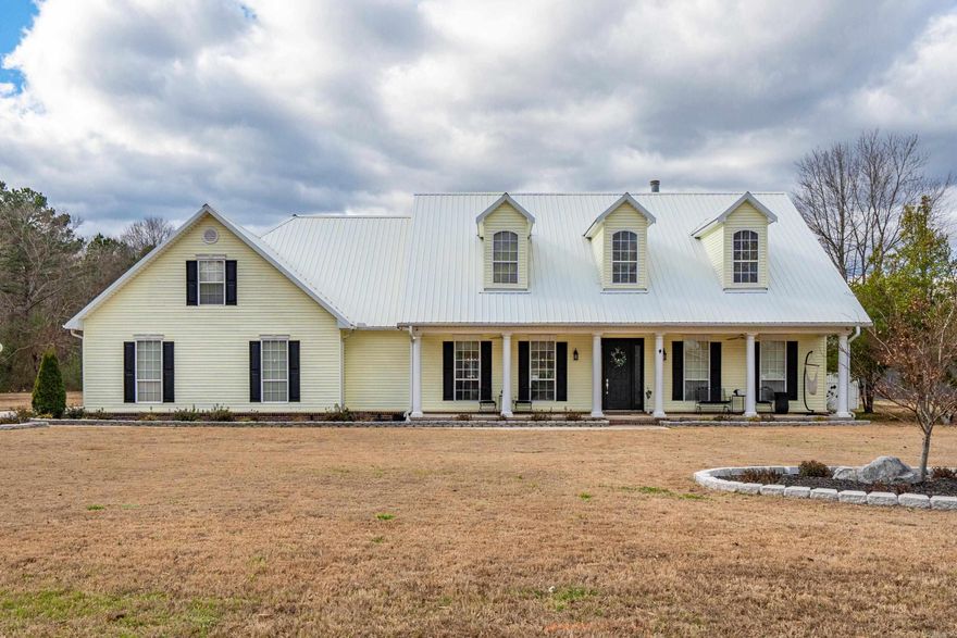 Take a look at this beautiful 3-bedroom, 2.5-bath home offering exceptional space, comfort, and versatility. The open floor plan features high ceilings and multiple fireplaces, creating a warm and inviting atmosphere. The kitchen offers abundant storage, a large island, and a breakfast bar—ideal for gathering with guests while cooking—along with a large walk-in pantry that includes a refrigerator. A bonus upstairs room provides the perfect option for a fourth bedroom, home office, or game room. Upstairs you will also find a large floored attic area for all of your storage needs. The split-bedroom layout provides privacy for both homeowners and guests. Just off the large living area, you’ll find two guest bedrooms and a full bath. The spacious primary suite showcases tray ceilings, custom built-ins, a cozy fireplace, a large sitting area or office nook, and private access to the backyard. The expansive primary ensuite includes an oversized shower, jetted tub, and a large walk-in closet.  Step outside to the fenced backyard and find a space perfectly designed for entertaining & relaxation, featuring a pool, cabana with island & grill, and additional half bath. Cont'd in Agent Remarks