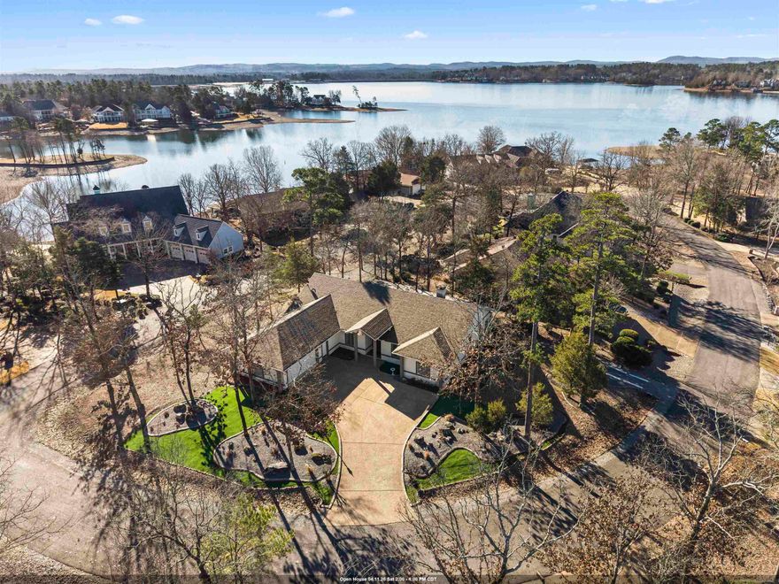 7 Resplandor Loop | Lake Balboa Views & Solid Build Experience peace of mind and luxury in this rare build: concrete walls with stucco exterior situated on a level, walkable street with beautiful views of Lake Balboa. This property combines "built-to-last" durability with a thoughtfully designed interior.  Home Highlights:  Perfect Layout: A split floor plan ensures primary suite privacy. Features include a large open living room with vaulted ceilings, a formal dining room, and a separate breakfast area.  Flexible Living: 4 bedrooms, office/sunroom off of primary bedroom, laundry room, Arkansas room, and screened-in patio for year-round enjoyment.  Modern Upgrades: Recently replaced roof, leaf guard gutters, new hvac, kitchen with updated appliances and countertops, and  professional landscaping with rock and Astroturf for effortless, low-maintenance curb appeal.  Parking & Storage: Level lot with a large driveway for easy turn-arounds, a dedicated golf cart/trailer parking area, and oversized garage with space for workshop and storage.  This property is located on a flat, easily walkable area surrounded by Lake Balboa, and only a short drive to Balboa Marina and the Balboa Gate.