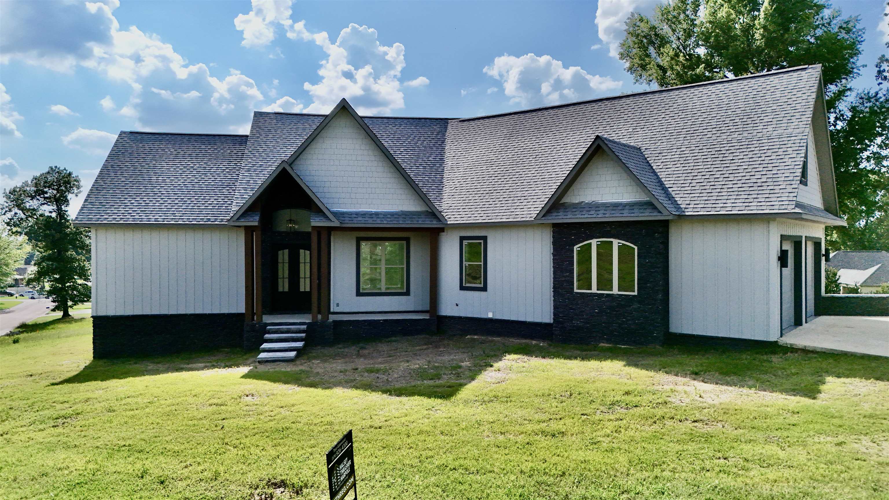 Discover comfort, style, and stunning views in this 3-bedroom, 2.5-bath home with 2,500 square feet of living space, perfectly situated on a spacious .47-acre lot in Wynne, Arkansas. Step inside and be greeted by tall vaulted ceilings in both the living room and the primary suite. The living area features a beautiful floor-to-ceiling fireplace, creating a warm and open atmosphere perfect for relaxing or entertaining. The heart of the home is the gorgeous kitchen, thoughtfully designed and flowing seamlessly into a bright sunroom that offers natural light and direct access to the back porch where you'll enjoy panoramic views of the entire town of Wynne. The primary bedroom is a peaceful retreat with soaring ceilings, while the two additional bedrooms share a Jack-and-Jill style bathroom, making this layout as functional as it is inviting. The home also includes a custom epoxy-finished garage floor a great touch for car lovers or workshop enthusiasts. This home offers a perfect balance of indoor comfort and outdoor charm come see it for yourself!