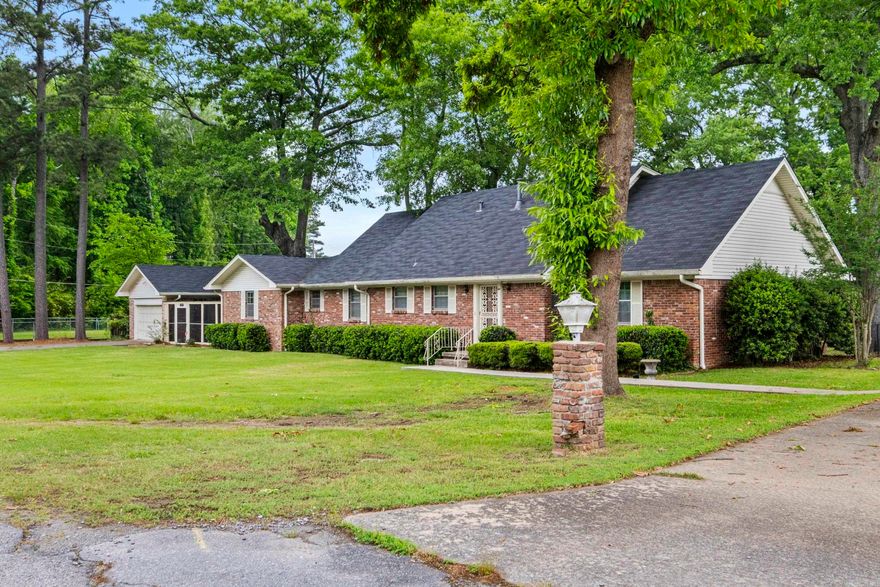 One-of-a-kind, Custom-Built Mid-century gem-this Iconic home is a true staple in Jacksonville! Nestled at the end of a quiet cul-de-sac, this beautifully maintained, one-family-owned property sits on 2 parcels totaling approximataely 1 acre; offering space, privacy, & timeless character! This home features a desirable layout with a Formal Living & Dining Room plus a Family Room with Fireplace & a Huge Game Room with Wood Burning Stove! The primary Bedroom is conveniently on the Main level and offers a massive Walk-in closet-originally designed as a 4th Bedroom-giving flexibility to easily convert it back, if desired. Unique touches include an Indoor wood-fire grill & custom-milled lumber sourced locally adding history & unique crafstmanship. The drive around & drive-through tandem garage is both functional and rare! You'll love the Sunroom off the front of the house for quiet mornings or relaxing! Recent updataes include a Roof (2020), New Kitchen Flooring and subflooring (2025), Hot Water Heater (2025). Just minutes to the LRAFB or Highway Access for Easy commute! Truly one-of-a-kind homes like this don't come along often! Such a Special Place to call Home! Check out the video!!