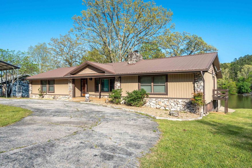 **PRICE IMPROVEMENT** on your serene lakeside retreat nestled amidst the natural beauty of the Ouachita Mountains, this lake home offers the perfect blend of tranquility and comfort.   Expansive deck, soaking in the breathtaking vistas of the lake and surrounding forest.  Boasting panoramic views of the shimmering waters of Lake Hamilton!  Conveniently located just minutes from downtown Hot Springs, with its renowned spas, restaurants, and entertainment options, this lakefront oasis offers the perfect blend of privacy and convenience.  Private balcony overlooking the water, and a cozy fireplace, providing a serene sanctuary to relax and recharge.  Don't miss your chance to own this exceptional property and experience lakefront living at its finest. Schedule your private tour today!
