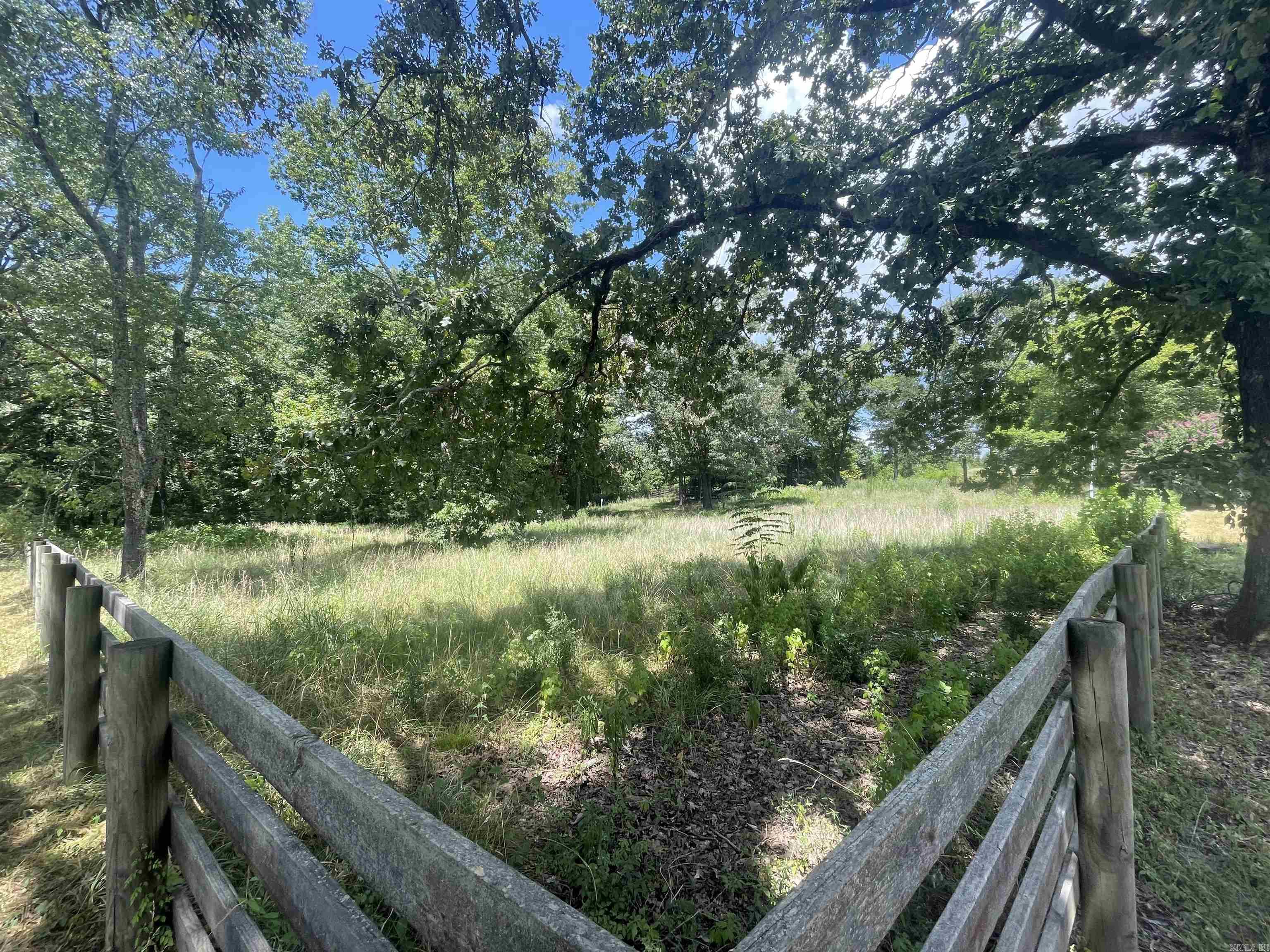 A place to build your dream retreat near the water. Discover 2.75 acres of serene beauty just minutes from the Little Red River and Greers Ferry Lakeāperfect for trout fishing, boating, or simply cooling off on those warm summer days. This partially cleared, wooded, and fully fenced property offers the ideal canvas for your future home, vacation cabin, or weekend getaway. A covered deck with septic, public water, and electricity already in place, youāre one step closer to turning vision into reality. Enjoy the privacy of nature with the convenience of town just a short drive away. Whether youāre craving peaceful mornings, outdoor adventures, or a new beginning, this land is ready to deliver.