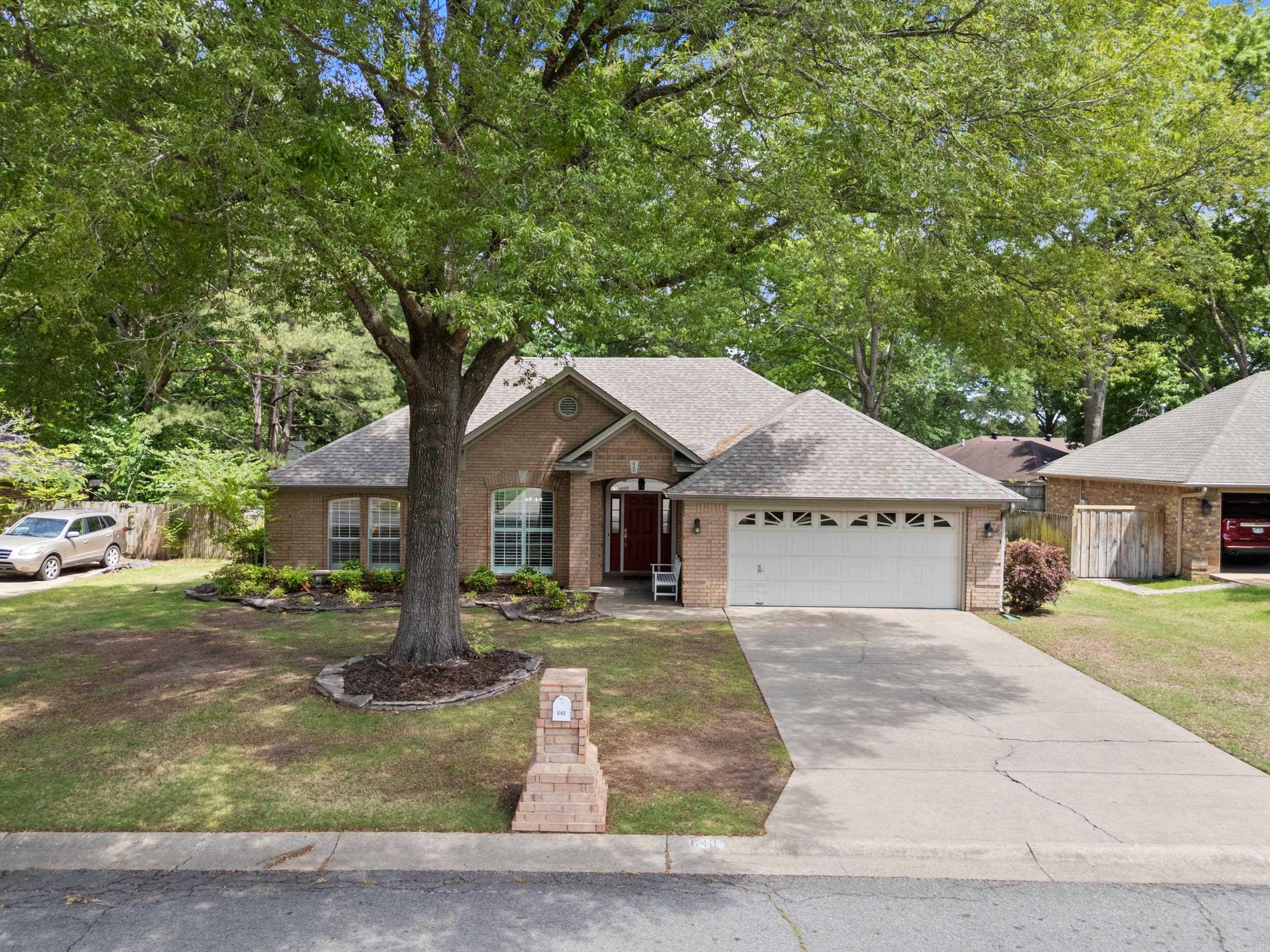 Location, Location, Location! This stunning 3 bedroom, 2 bath home in Conway’s sought after Saddletop Subdivision was completely remodeled just a few years ago & is full of character and high-end finishes. Step inside to the spacious living room with beautiful engineered hardwood flooring, stained tongue-and-groove tray ceilings, ship lap accent wall and cozy wood-burning fireplace that adds charm. The chef’s kitchen includes quartz countertops, tons of cabinets to the ceiling & two pantry cabinets. The luxurious primary ensuite features quartz countertops, soaker tub, custom tile shower with rainfall shower head, skylight, and spacious walk-in closet. Outside, you’ll love the large deck, lush landscaping, and sprinkler system. Updates include: NEW window coverings including some Plantation Shutters, NEW deck (2023), some new interior paint, sealed & recaulked doors & windows, skylight resealed, Smart home features including NEW Nest thermostat, NEW Leaf filters Guards added to all gutters, tree trimming & HVAC on service plan. Storage building & FREE lawn service for 2025 included! Just minutes from shopping, restaurants hospital & UCA! Won’t last long! See Agent Remarks