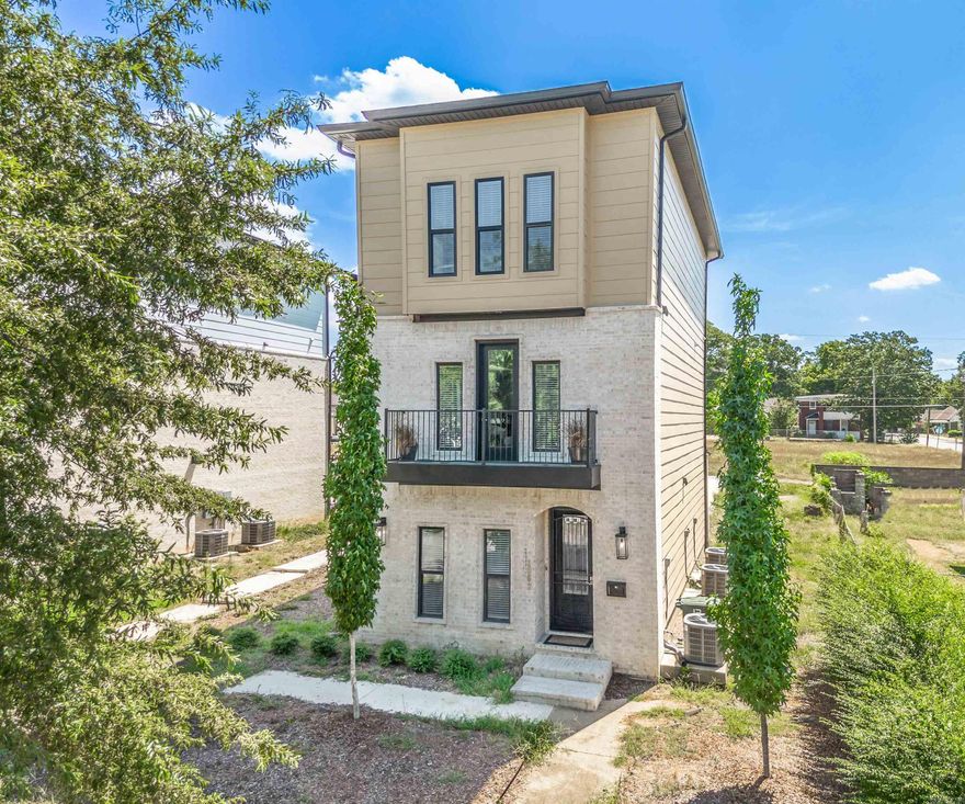 Seller offering $5,000 allowance or credit with acceptable offer. Welcome to 1867 S Ringo Street—a newer construction residence offering three levels of sophisticated living in the heart of Little Rock. This thoughtfully designed 3-bedroom, 3.5-bath home features ensuite bedrooms on every floor, ensuring ultimate privacy and flexibility. The first floor hosts a private guest suite with its own bath, while the second floor boasts an open-concept living area with beautiful hardwood floors, abundant natural light, and a stylish kitchen complete with stainless steel appliances, granite countertops, a butcher block island, and custom cabinetry. Upstairs, you’ll find two spacious bedrooms—each with a private bath—and a convenient third-floor laundry area. Smart details throughout include recessed lighting, crown molding, modern fixtures, and a premium carpet runner on the stairs. The rear-entry garage is EV-ready, providing both secure parking and modern convenience. Located minutes from downtown, this home blends upscale urban living with comfort and efficiency—perfect for professionals, investors, or anyone seeking stylish space near the city’s vibrant core.