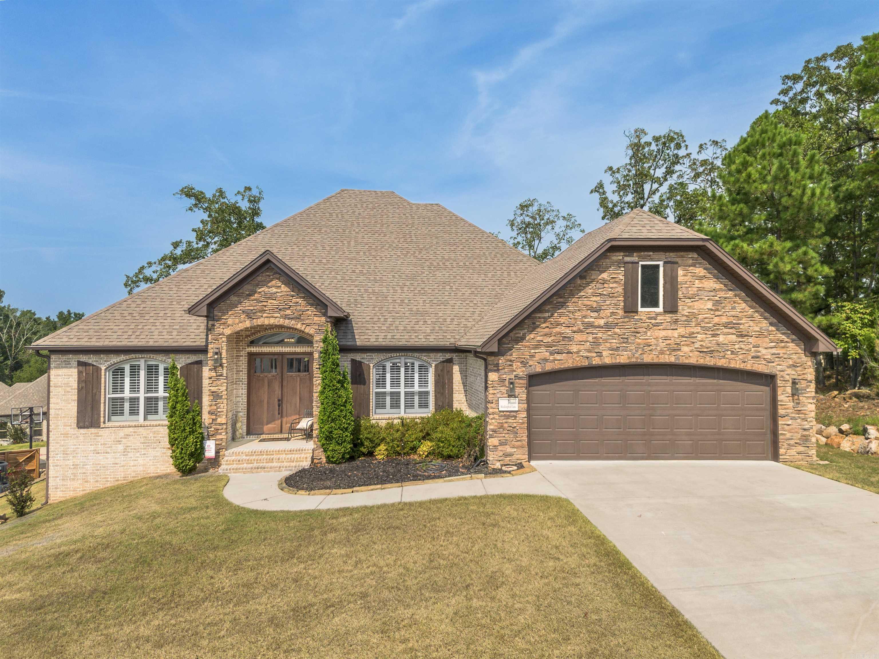 Welcome to this stunning custom built home with an open floor plan. Featuring 3 spacious bedrooms, dedicated office, and a formal dining room, this home offers both comfort and functionality. The kitchen is a chef's dream, boasting abundant cabinet storage, a breakfast bar, wall over, granite countertops, farmhouse sink, and stainless appliances. In the living room, wood beam accents and a stone fireplace hearth create a warm, inviting atmosphere that opens to a covered patio and deck-perfect for entertaining. The Primary Suite s a true retreat, completer with a luxurious bathroom featuring a walk-in shower, soaking tube, dual sinks with ample storage, and an impressive walk in closet. Conveniently connected, the laundry room includes a sink, generous counter space, and additional cabinetry. This home is the perfect blend of thoughtful design, comfort and style.