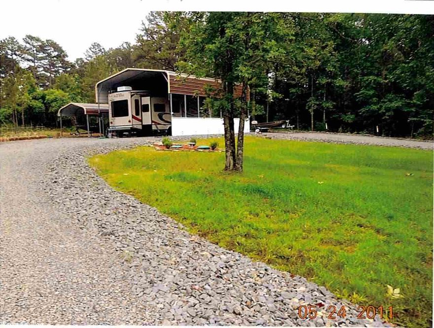 2 Lots (1.1 acres)that are the last lots before you enter Cherokee Park-Launch Ramp & swim area. Septic System installed in 2009,2- 12x21 carports,1- 24x36 carport,10x12 storage building,10x16 storage building w/electricity, & window unit for a/c. New 2011 35'6" BLUE RIDGE 5th Wheel w/4 security cameras,Corian Countertops,2 flatscreen Tv's,washer/dryer hookup,living room couch w/full size inflateable bed,2 lazy boys,gas range,tinted windows, See docs...