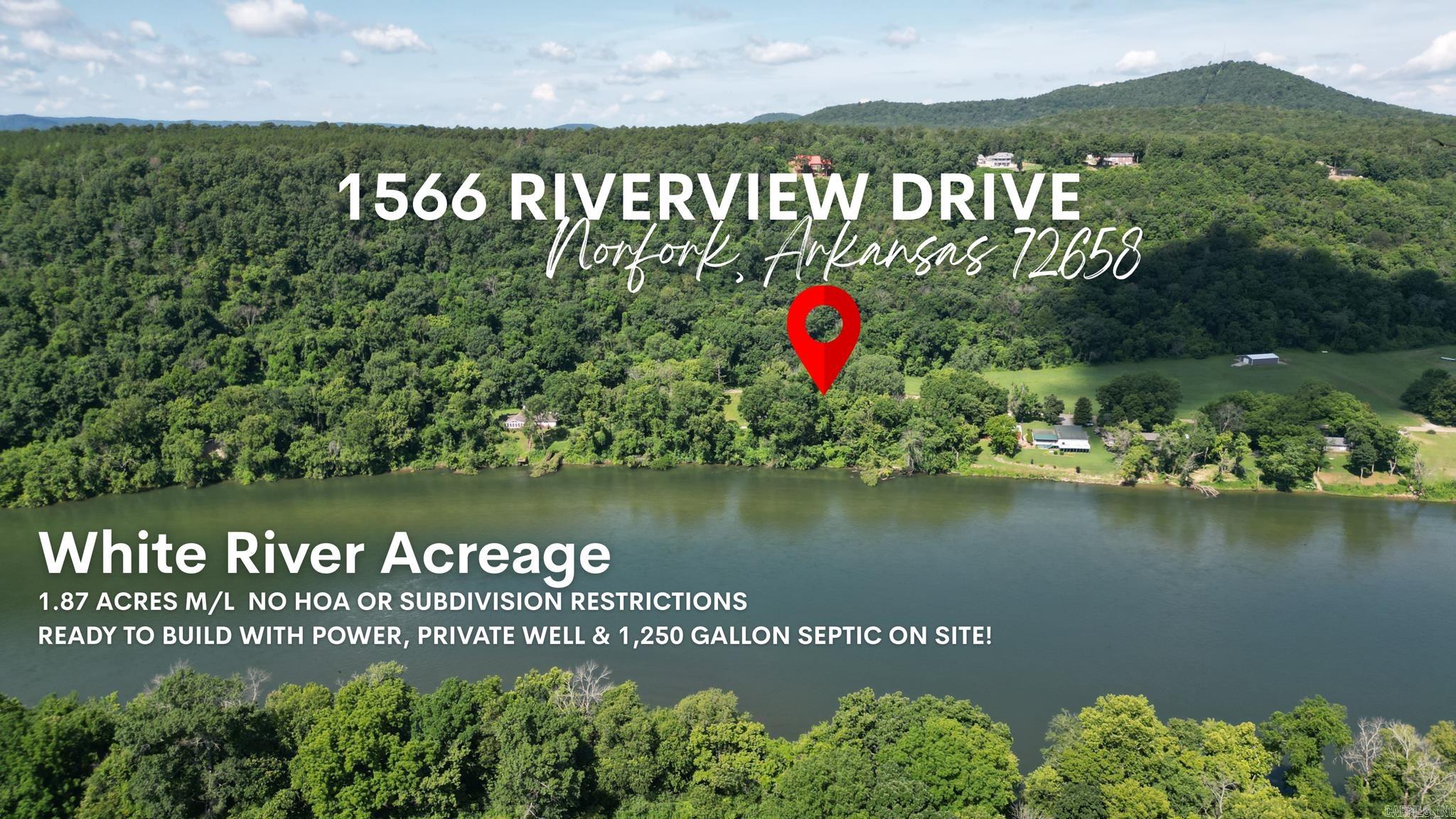 Welcome to 1566 Riverview Driveā1.87 acres of prime, build-ready land fronting the world-famous White River in Norfork, Arkansas. With approximately 366 feet of mostly level, gently sloped river frontage, this rare property offers the perfect blend of accessibility and breathtaking views. Just past Norfork Village and inside city limits, youāll find no subdivision restrictions or minimum build requirementsāgiving you the freedom to create your dream escape, vacation rental, or forever home. A private well, new 1,250-gallon septic system, and electricity are already in place. Nestled among high-end homes with a paved road and easy access, this is one of the few remaining riverfront parcels that checks all the boxes.