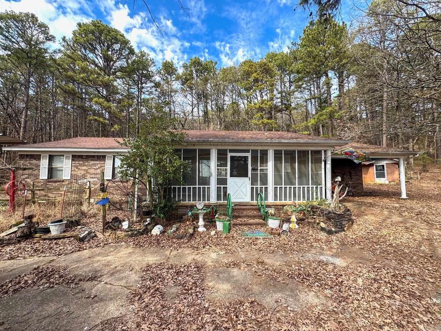 A ranch style fixer upper!!! on over 37 acres m/l. Such character with so much potential in a PRIME location!! This one will not last long! Call today!