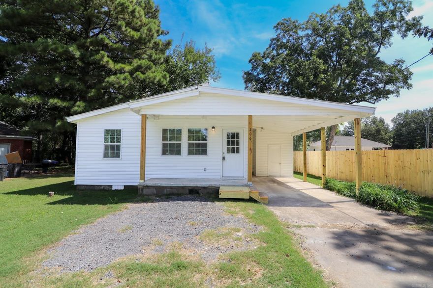 This recently remodeled 3-bedroom 2-bathroom gem is a testament to modern comfort and style! Step inside to experience a fresh, contemporary atmosphere with NEW paint, flooring, light fixtures, cabinets, countertops, and stainless steel appliances. The open floor plan seamlessly connects the living area to the stunning kitchen. The master bedroom features not one, but two closets, providing ample storage space for your wardrobe and personal belongings. You'll love the convenience of the one-car carport, ensuring your vehicle stays protected from the elements. Outside, a generous backyard awaits, complete with shade trees that offer a peaceful retreat for outdoor relaxation, gardening, or playtime with the family. This 3-bedroom, 2-bathroom home in Bay, is the perfect blend of modern elegance and practical living. This home qualifies for 100% financing with a USDA loan! Schedule a viewing today and make this beautifully remodeled home your own!