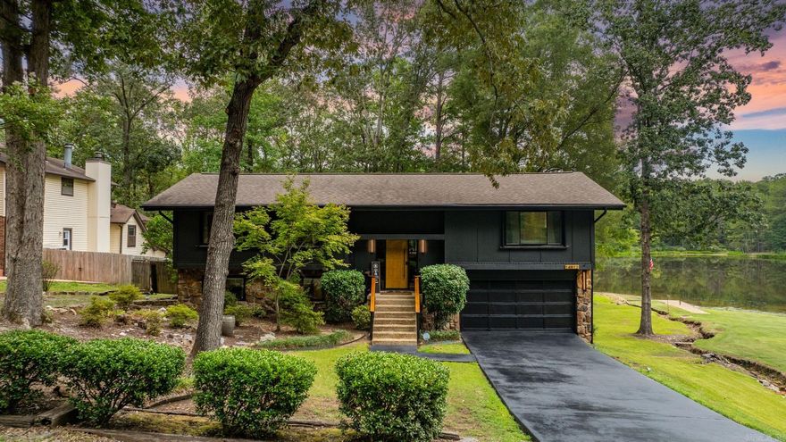 Welcome to this beautifully updated home offering modern style and serene lakeside views!   Featuring 3 bedrooms and 2.5 baths plus bonus/flex space, this residence is set on the neighborhood lake in the desirable West Little Rock: Spring Valley Manor community.   The main level boasts an open living and dining area with plenty of natural light, where you can find frequent deer sightings, adding to the natural charm of the home. The Café GE refrigerator is included in the streamlined, spacious kitchen.   The versatile layout includes a downstairs office/flex space, ideal for remote work or hobbies with the convenient half bath. The lower level also offers the laundry space.   Enjoy direct lake access with a shared dock perfect for kayaking, paddle boarding, swimming, and recreation, a rare find in West Little Rock. With its blend of modern updates and outdoor lifestyle, this property is move-in ready and waiting for its next owner.  Agents see documents for all of the upgrades!