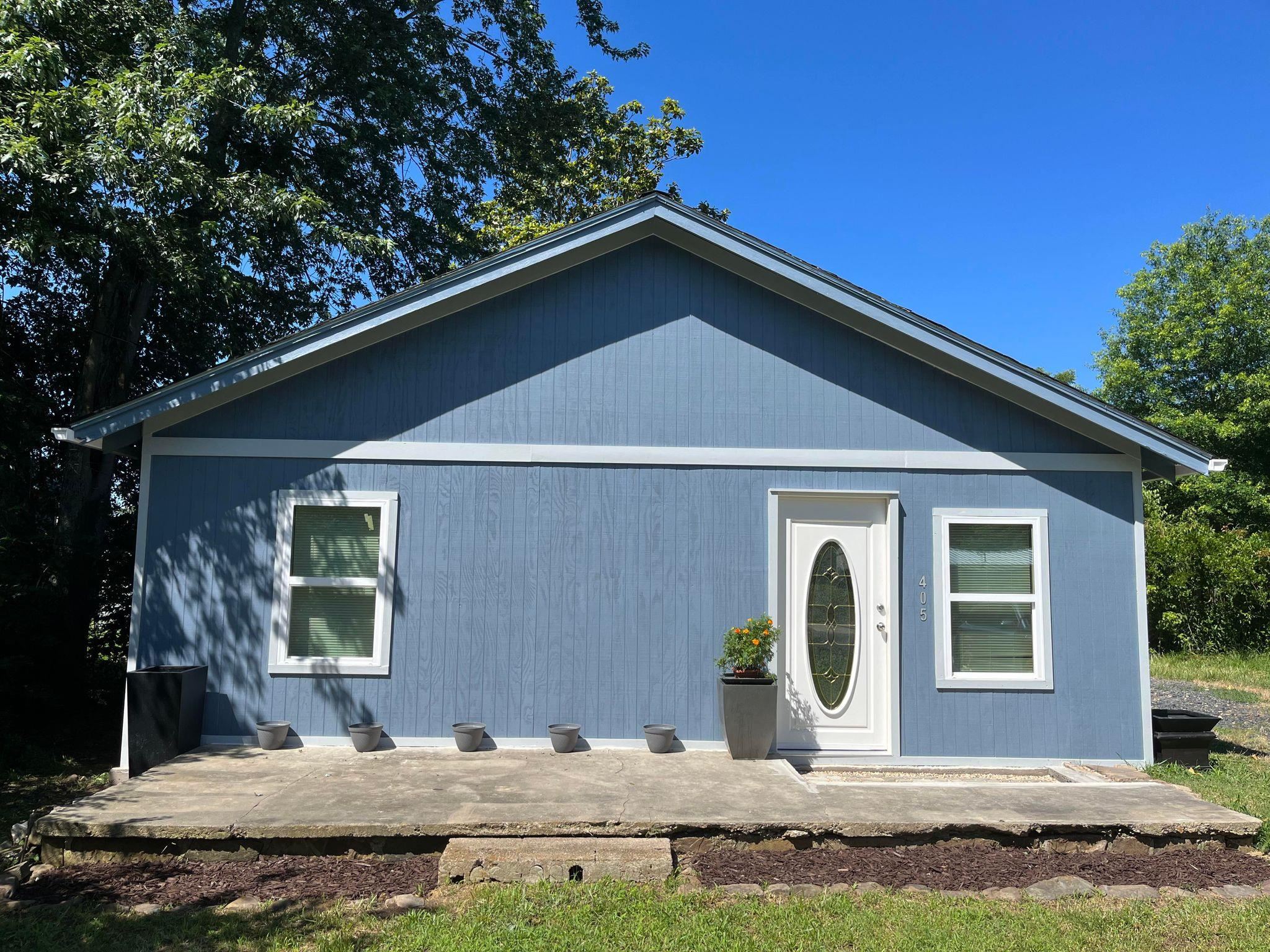 Adorable 2/bed 1/bath home in downtown Mena! Completely redone interior with brand new refrigerator, stove, sink, shower, toilet, light fixtures, fans, electric fireplace and roof!! The property also includes a new water heater, plumbing, electrical wiring, and subfloor/floor. This would make a perfect rental, Airbnb or residence! Comes fully furnished! Just minutes to hiking trails in the Ouachita National Forest, and future mountain biking trails! Don't miss this turn-key opportunity!