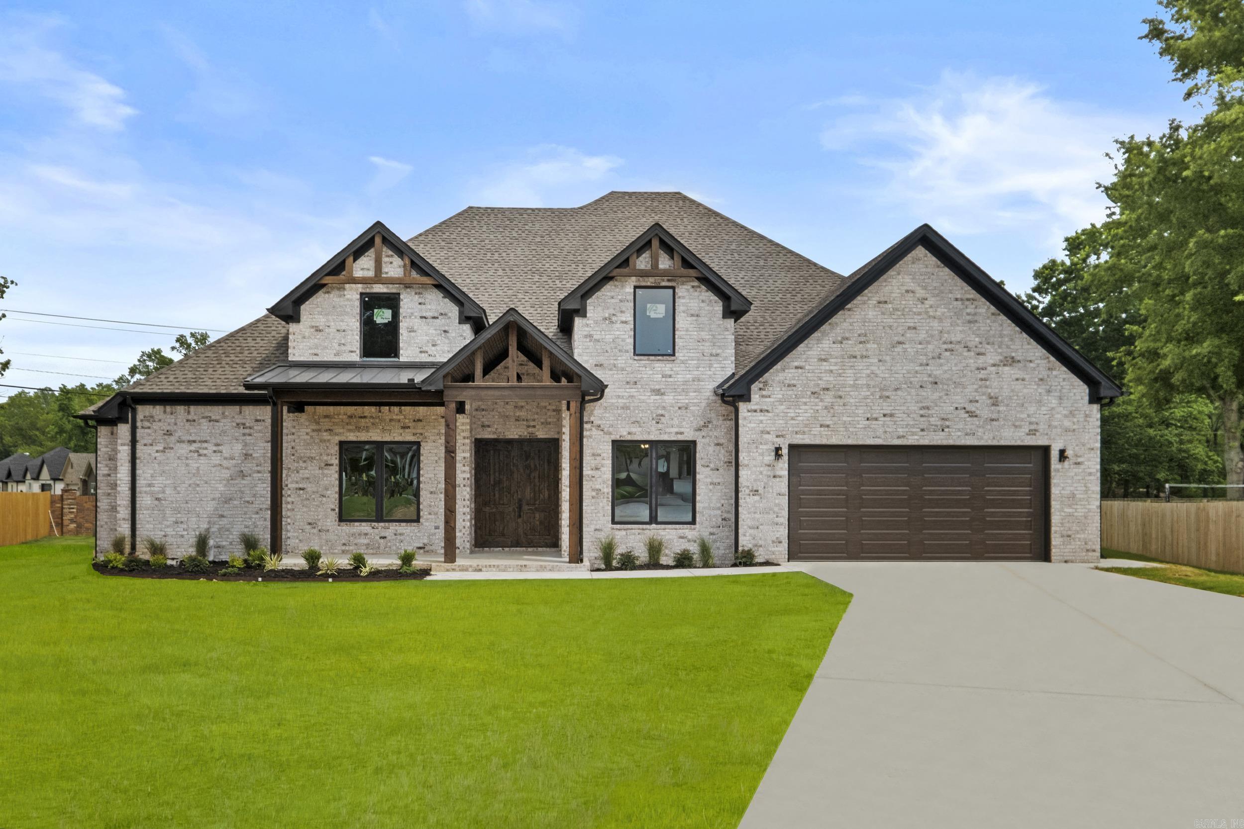 This New Construction home offers a harmonious blend of modern amenities and classic charm, ensuring comfort and style. This beautiful one-story 2,800 square foot, home provides ample space for living and entertaining. The open floor plan enhances the flow between rooms, creating a seamless living experience. It features four spacious bedrooms, with 2 1/2 bathrooms, providing convenience and privacy. Enjoy the warmth and ambiance of 3 stunning fireplaces, each carefully positioned to enhance the coziness and charm of the home, making it perfect for intimate gatherings or relaxing evenings. Luxury upgrades include: vaulted ceiling, wood beams, ss appliances, soft close cabinets, abundance of storage, a wet bar, oversized patio, 2 car garage, and so much more! This modern craftsman home is a must see!