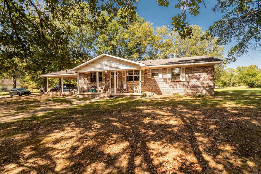 This gem is located on the edge of town. With around 3.8 acres of beautiful yard including a peaceful pond. The brick home has 3 bedrooms, 2 bathrooms and plenty of storage including a large laundry room. The convenience of quick access to the city along with having plenty of yard to enjoy makes this an easy choice for a home buyer. Come see it for yourself and schedule a tour.