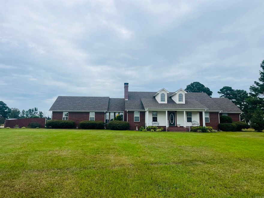 Check out this stunning home, featuring a 3 bedroom 2 bath brick home just a few miles south of Malvern.  Enjoy the spacious layout of this meticulously kept home that features custom cabinetry, tile flooring, large back porch, a sunroom, and an oversized 2 car garage.  Sitting on approx. 2 1/2 acres of level, landscaped property, you will also find a matching brick shop that features a full bathroom and a wood burning stove. A Gazebo and paved driveway are other added amenities to this property!