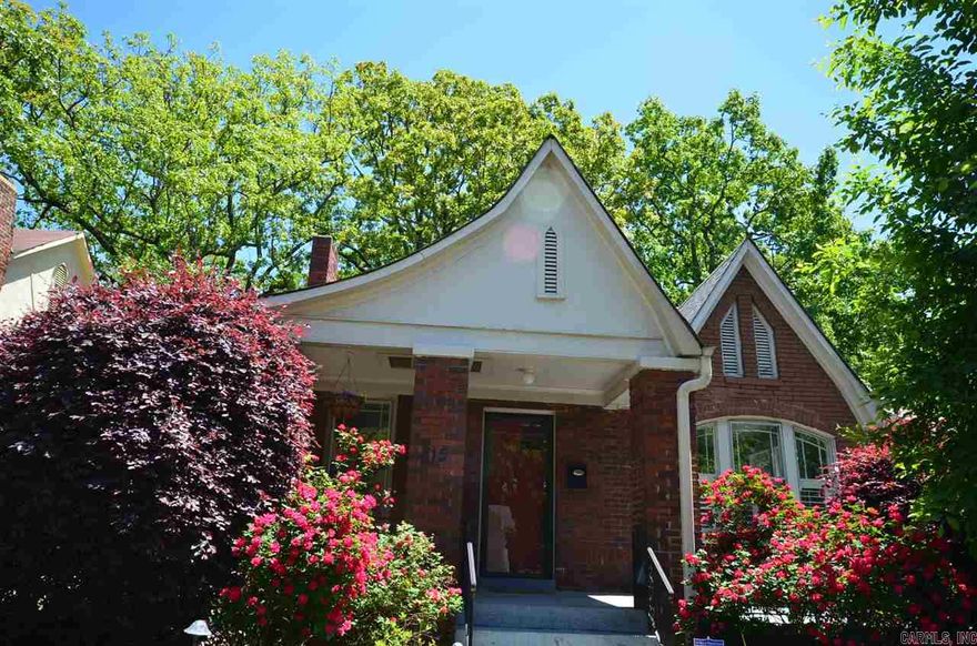 OPEN SUN 4/26-GOOD LOOKING 1920'S RED BRICK WITH CARPORT AND 2 WORKSHOPS,XL LAUNDRY NOT IN SF- OAK FLOORS, 2 BD 1 BATH DOWN -  UNIQUE SPACE UPSTAIRS WITH WOOD CEILINGS ,4 NEW WINDOWS UP- ROOF AND DECKING 2012- PLANTATION SHUTTERS-GAS LOG FP WITH GLASS TILES - SS REFRIG STAYS- STACKABLE W/D STAY- BATH  REMODELED WITH SUBWAY TILE AND FRAMELESS TUB DOOR-WALL TAKEN OUT IN DINING - NICE OAK STAIRWAY - PLANTATION SHUTTERS-LARGE L SHAPED DECK OFF KITCHEN AREA- LANDSCAPED BK YD W/ FIREPIT- 1815 SF PER JOHN GOSS
