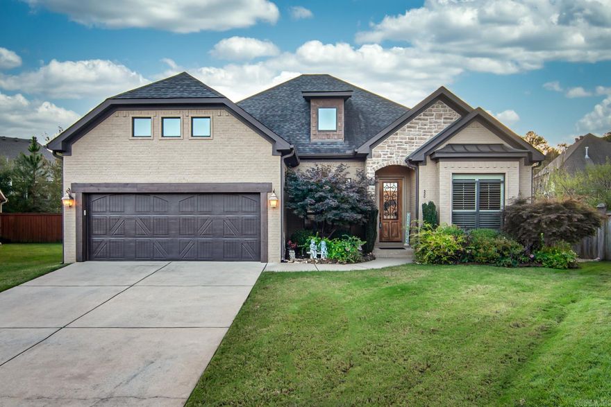 Custom-built home by Kevin Keathley on large, pie shaped lot with tall, coffered ceilings, beautiful moldings, hand scraped walnut floors, plantation shutters and so much more. There are 3 bedrooms plus an office. Built-ins bookshelves are in the office. The chef's kitchen is open to the great room with cozy fireplace. There is a split bedroom plan with 2 bedrooms and hall bath on the right and primary suite on the back left. The kitchen has top of the line stainless appliances, abundant cabinetry and a walk in pantry. Conveniently located nearby is a laundry room with sink and granite counter tops. Walk outside to a covered veranda and spacious backyard that is fully fenced. Abundant storage, security system and sprinkler system. Call today to see this pretty home.