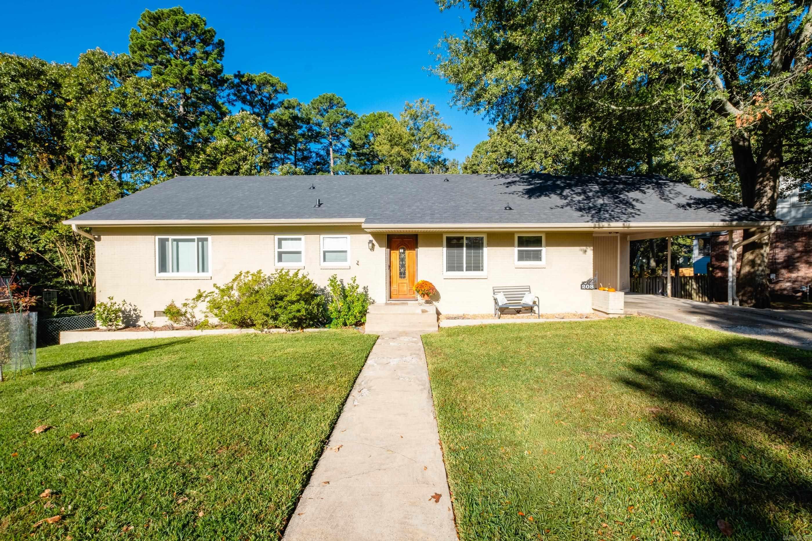 Very pretty home tucked away in a great location of Kingwood, very private and on oversized cul-de-sac lot with lots of trees, landscaping and space!  Mostly one level home has 1883 sq ft on the main floor and upstairs is an additional 189 sq ft of bonus space not included in the square footage.  Hardwoods throughout most of the home in great condition, bright kitchen with oak cabinetry.  A living/dining area overlooking the backyard plus a big den with fireplace - lots of room!  3 nicely sized bedrooms and the primary has a private bathroom with shower.  The guest/hall bath has been completely remodeled to the studs w/ new tile floors, granite vanity, tub/shower w/ tile surround - super pretty!  Enjoy the outdoor deck areas and grilling spaces, lots of room to entertain.  Also an attached storage area at the back of home.    UPDATES: Brand new roof this week; Siding eaves/soffits/gutters/downspouts in 2023; Insulation added in 2021; Complete HVAC system w/ new ductwork & plenum in 2019.  Must see this great home!