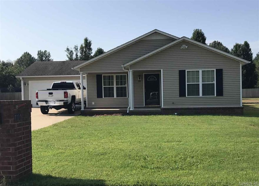 Lovely home located in a convenient area inside the city limits. Nice open floor plan. Extremely well kept. Security system can be activated at tenants expense. Two car garage has a workbench and storage closet.  Application is required. Non refundable application fee will be charged for tenant screening.  Apply at the listing office.
