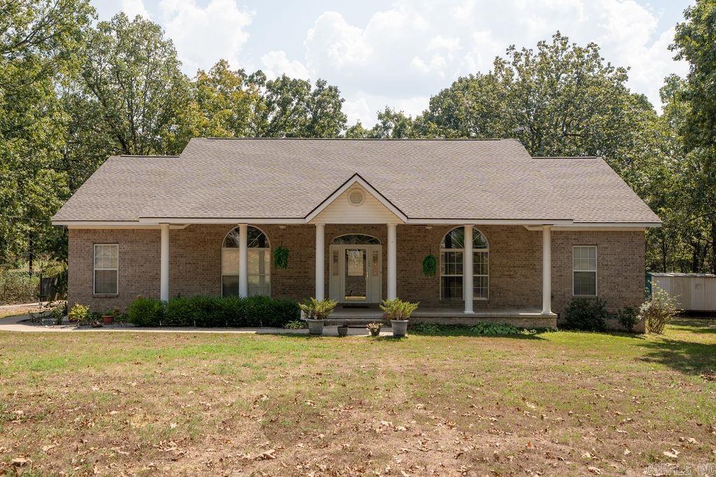 Set back from the road for peace and privacy, this home offers an open floor plan designed for comfort and gathering. Inside, you’ll find the living room fills with natural light, plus a game/bonus room that’s perfect for entertainment, a home office, or hobbies. The property includes 4+ acres of wooded land to explore, providing the perfect blend of nature and space to roam. A 32x32 shop building offers endless possibilities for storage, projects, or workspace. In addition, there is a second home on the property that may also be purchased, making this a rare opportunity for multi-generational living, investment, or guest accommodations. If you’ve been searching for a private retreat with room to grow both inside and out, this property is for you!