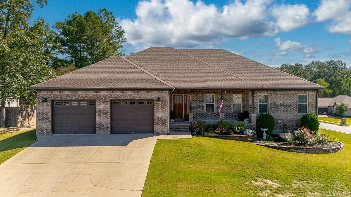 WOW!!! Picture Perfect Home.... Amenities Include: Approximately 2206 Square Feet, 4 Bedrooms ( 4th Bedroom is Office / Bedroom ), 2 1/2 Bathrooms, Split Bedroom Floorplan, Open Concept Floorplan, Living/Dining Combo, Kitchen/Dining Combo, Large Primary Bedroom, Nice Walk in Closet open to Laundry Room, Primary bathroom has separate walk in shower with jetted tub, Laundry Room with Built-ins and Sink, Chef's kitchen with ample cabinet space, Pantry, Breakfast bar, corner lot with extra landscaping, covered screened in patio with additional wood deck, 2 Car Garage with gas wall heater, 22' x 36 ' Shop with air conditioning and bathroom and a 15' x 36' overhang for RV Storage. This home has it all and is immaculate.... A Must See, truly a custom home....