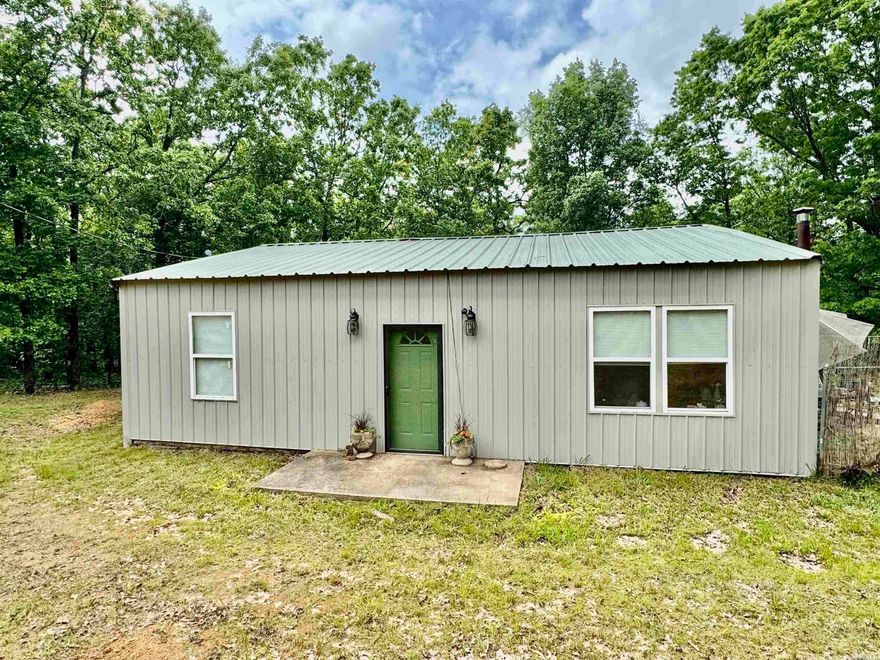 Cute 2Bd 1 1/2ba house with 6.50 ACRES of land. New luxury vinyl throughout, New Cabinets, dishwasher, Wood stove that's cool to the touch, entire house has been repainted. Home has a large laundry room, plus there is a pantry. New lighting fixtures. The home has 2 window units, wood stove, propane cook stove with two 100# bottles, Home has city water but still has a working well on the property. New hot water tank 2025. Septic tank is 1000 gal. The ductwork is already ran to have central heat and air installed. The property is also already fenced around the entire property. There a storage building that's 12x16 but also has two covered spots. one covered spot is big enough for a vehicle. Owner used to have horses here. This home is a must see!