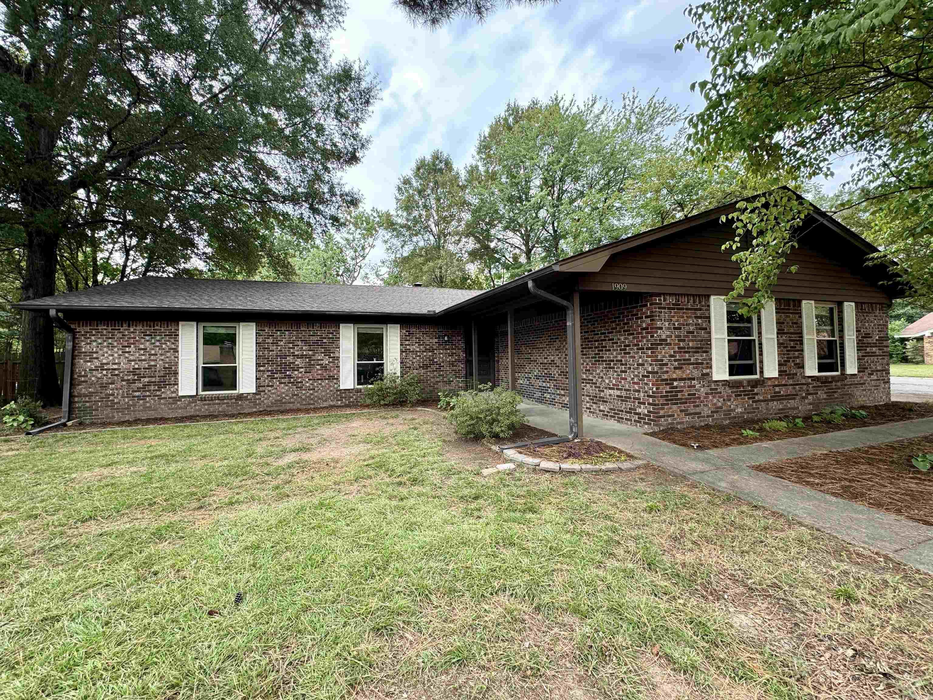 Welcome to 1909 Creekwood Drive, a beautifully updated home nestled on a desirable corner lot in one of the most walkable areas of town! Just a short stroll from Bell Urban Farm, the scenic Tucker Creek Trail, and the Faulkner County Library, this move-in ready gem blends modern updates with cozy comfort. Step inside to find renovated primary and secondary bathrooms, new paint and built-in bookshelves, fresh and stylish with today’s finishes. The home boasts major upgrades throughout, including a new HVAC system (installed just 2 months ago), a 10-month-old water heater, 2 month old refrigerator, and 2 month old dishwasher, and a 4-year-old roof, giving you peace of mind for years to come. Relax or entertain year-round in the enclosed sun porch, a perfect space to enjoy morning coffee, cozy evenings, or indoor-outdoor living. With thoughtful updates, unbeatable location, and inviting charm, 1909 Creekwood Drive is the perfect place to call home. Don’t miss your chance to tour this updated beauty—schedule your showing today!