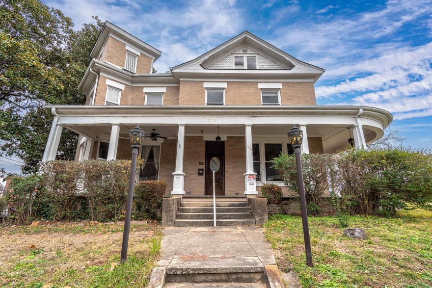 ATTENTION INVESTORS!   Step into history with enchanting, one-of-a-kind home nestled in the heart of downtown Hot Springs Historic District.  A true gem, this timeless 1908 property offers a world of possibilities for the VISIONARY INVESTOR.  Imagine transforming this captivating space into a Boutique Hotel, bed-and-breakfast, an elegant vacations retreat, or a luxurious long term rental.  The charm of yesteryear meets modern potential, making it an exquisite backdrop for bridal parties and wedding celebrations, where love stories can unfold in an intimate, unforgettable setting.  With its graceful architecture and location, surrounded by local shops, restaurants and attractions, this historic treasure promises not only change but an exceptional RETURN ON INVESTMENT. Do not miss your change to own a piece of Hot Springs history, where dreams and opportunities come to life.