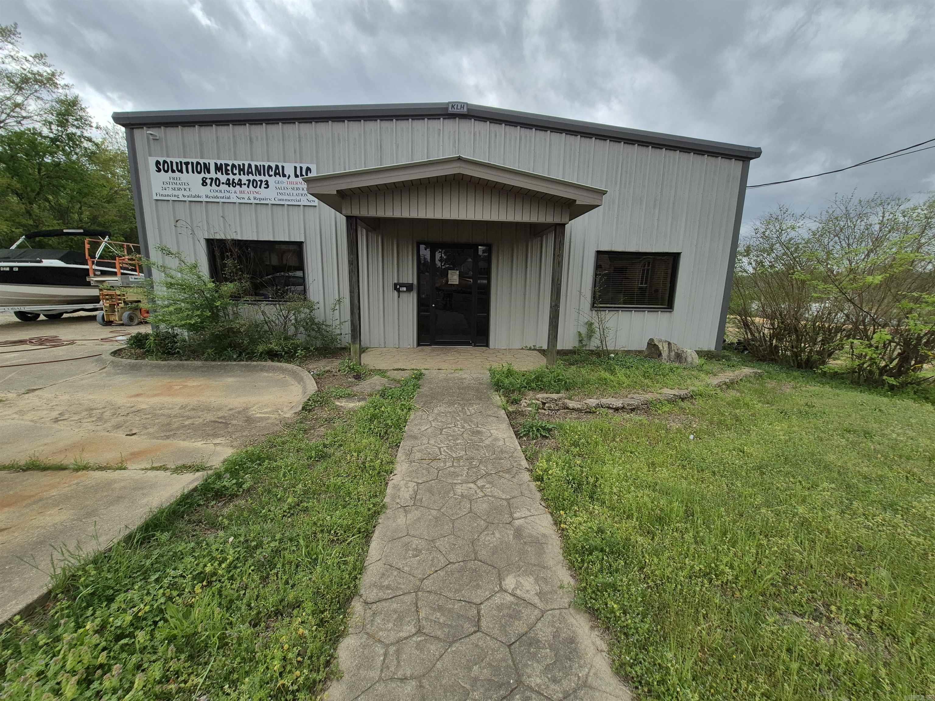 3 bay shop with Highway frontage. Upstairs storage, Office space includes 4 offices and 1 1/2 baths. Shop Area Includes 3 bays, HVAC, Shelving, upstairs storage and serval work benches. Currently operational Appointment required for showings.