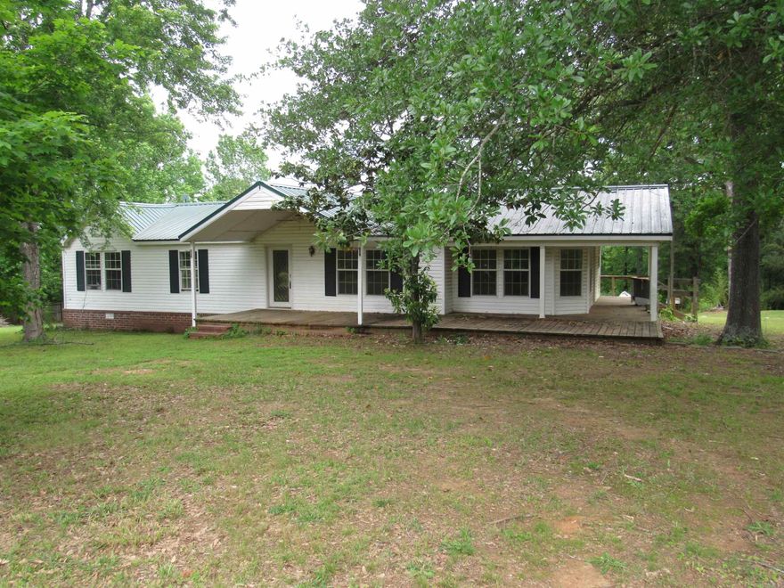 Secluded manufactured home on permanent foundation crawl space, level area of lot then slopes down to Greenbrier Creek