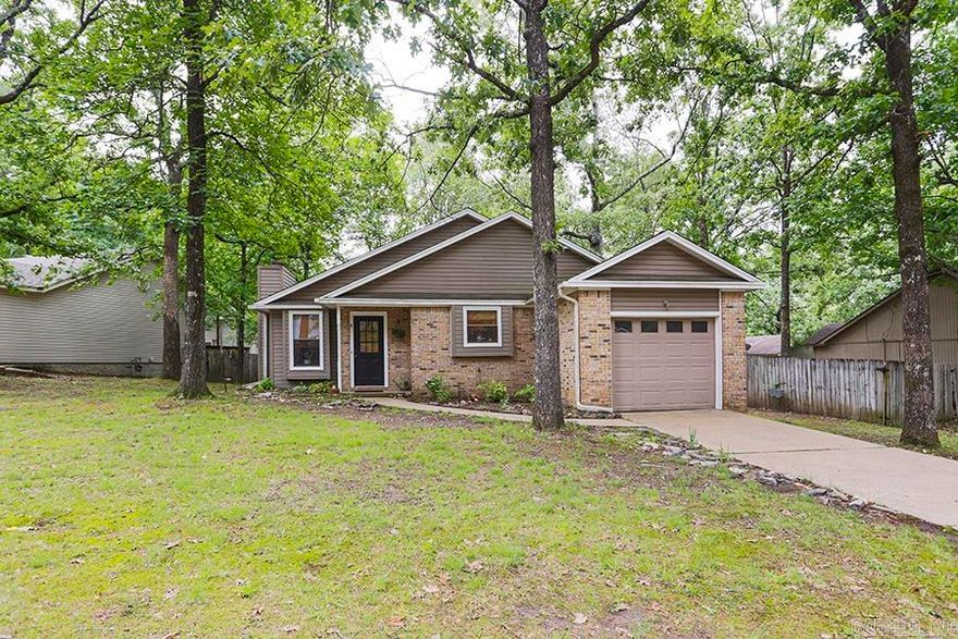 Welcome to this precious cottage nestled in Point West.This one-story home is a charming retreat that offers a perfect blend of comfort and convenience. Upon entering, you’ll love the open floorplan & soaring vaulted ceiling.The living area features a cozy fireplace with gas logs and flows seamlessly into a breakfast area which adjoins the pretty kitchen & breakfast bar (updates include new paint,light fixtures, countertops, & under cabinet lighting). This space is perfect for casual dining & opens up to a private deck, extending your living space outdoors.The home features 3 bedrooms & 2 full baths with new, low maintenance vinyl flooring & flat ceilings.The primary suit has a large walk-in closet & private bath. And both baths boast new vanities & sinks! Outside, you'll find a fenced backyard, offering privacy and space for outdoor activities or pets. The deck is a great spot for barbecues or simply enjoying a cup of coffee in the morning. And the home also has a one-car garage for convenient parking. This home is just a stone's throw away from shopping & restaurants , and the level lot adds ease of maintenance for a lifestyle of comfort & convenience!*SEE REMARKS*