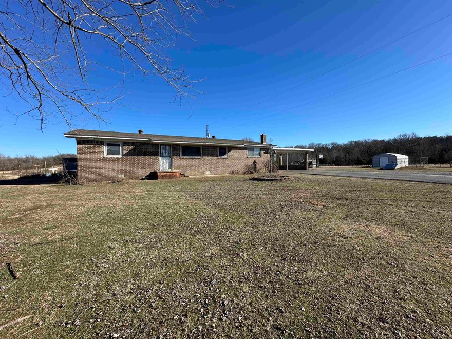 Beautiful homestead setting on 30 plus acres. House includes 3 Bedroom 2 bath and bonus room that could be used as dining room, office or play area. Home include New HVAC, 8YR old roof, Owner is in the process of updating the stove and vent a hood in kitchen. Almost all of the acreage is pastureland with 2 ponds. Large pond at the front of the property contains sport fish like Bass and Crappie. Property comes with Storm shelter, 2 Shops, 1 pole barn huge Basket ball court, and a storage building. Den has place for a Wood burning stove (none present at this time). Plenty of room on the property for livestock/poultry, the possibilities are endless.  Home and acreage listed separately see MLS#25004642 & 25004447