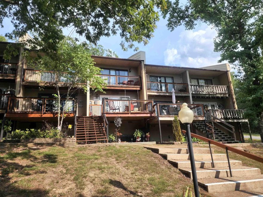 Nicely remodeled Condo steps away from all the action at the cool pool, Tennis courts or even a nice walk to Bowling & Mini Golf! This condo can be utilized as a nightly rental, will be a turn key condo. Nearly all the furnishings can stay, new HVAC, carpet upstairs, flooring, fixtures, counters, paint, furnishings and so much more make this condo a Great Buy! & it's an end unit!!