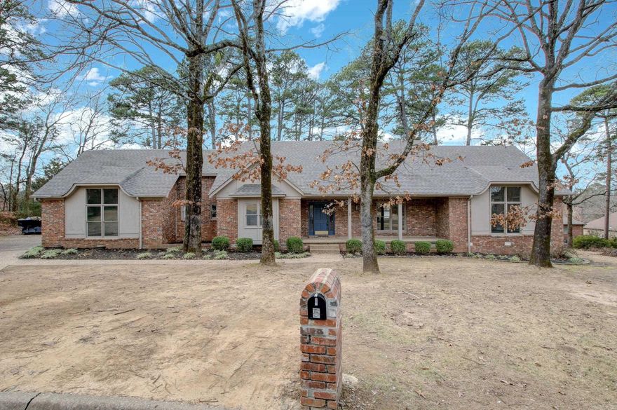 Beautiful Four Bedroom, Four Full Bathroom home tucked into a quite culdesac in the heart of West Little Rock's Longlea Addition (Don Robert's Elementary) on almost a half an acre lot with  a welcoming deck perfect for enjoying the beautiful outdoors. This home has been fully updated with lovely new finishes throughout. Upon entering the home you are welcomed into the open foyer that leads to the great room, dining room, and the attractively appointed kitchen with quartz countertops, beautiful tile backsplash, new appliances, and lovely breakfast nook. The floorplan for this home is absolute perfection making for a great home to entertain. The private areas downstairs include two spacious master suites with vaulted ceilings and both w/ full bathrooms complete with custom tile showers, quartz countertops and plenty of closet space. Oversized windows flood the interior with natural light. Two additional bedrooms and a full bath are upstairs. HVAC systems are circa 2023 and 2018. New roof 2/24.  Seller is offering a buyer incentive in the amount of $7500. Agents see remarks.