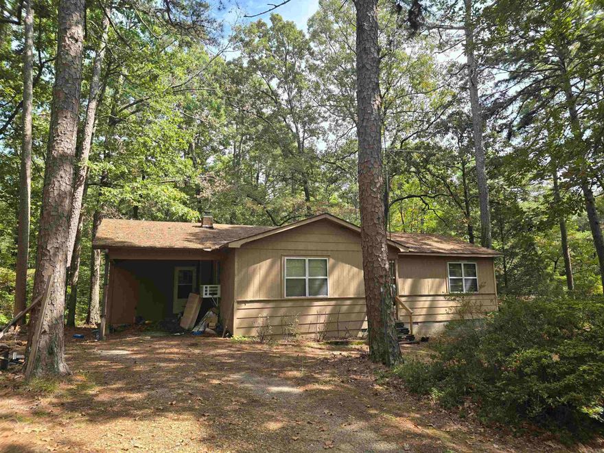 Welcome to the market this rare find in Craighead County, Arkansas! In a rapidly developing area known as Brookland, Arkansas within Craighead County you will find this beautiful 16 +/- private, wooded Acres at the end of a private drive surrounded by long term adjoining family neighbors! This area is a much sought out homestead and rarely does it become available for sale! On the land, you will find an appx 1240 sq ft home featuring 3 bedrooms, 2 bathrooms, a large laundry room, large dining room, a carport and TONS of potential! With some skill, this home could be restored and updated to your liking. The land itself has plenty of potential for a multi family area or even development. The sky is the limit! Properties like these do not come to the market often so ACT FAST!
