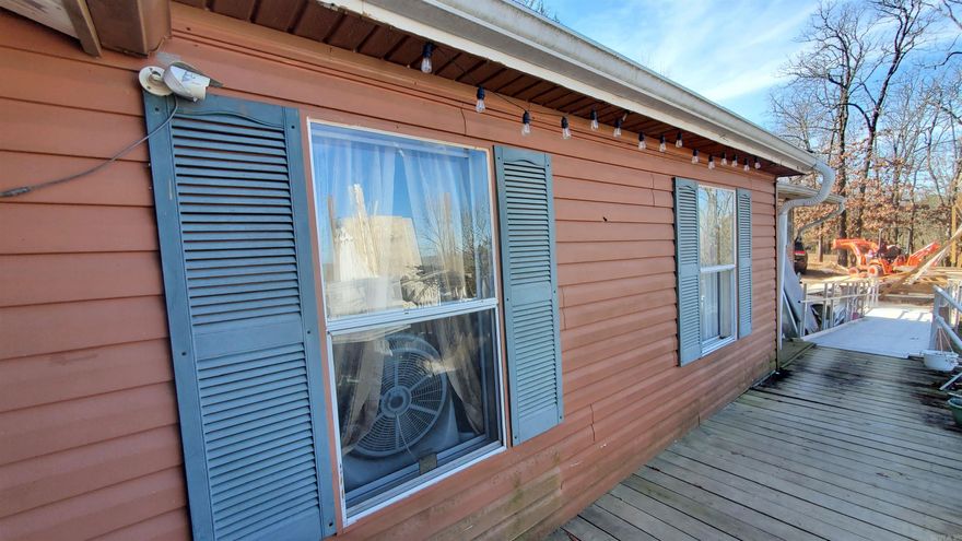 River Heights Estate home is located on a quiet 3 acre corner lot.  Enjoy Beautiful mountain views year round from your own front porch.  Home is 3 BD, 2 BA with a living room, laundry room, eat-in kitchen, den and an enclosed front porch.  Master bedroom has an attached full Master bath with garden tub and shower.  The other two bedrooms and a second full bath are on the other end of the home for optimal privacy.  Kitchen comes with a large SS Refrigerator, Dishwasher and Electric Oven.  Laundry room comes with a Washer & Dryer.  Stay comfortable with Central air conditioning with electric heat.  Hot water heater & metal roof is newer 3-4 yr.  Sewer is a septic tank and Water is municipal.  Cable & wifi currently through Windstream.  There's also a 2 car garage and a wood deck.  Property is a convenient 2 minute drive around the corner from the Bigelow Park on Co road 86 for fishing and public boat access to the Arkansas River.  This MH is being Sold As Is and needs some TLC.  Come see for yourself the potential this home has to offer.