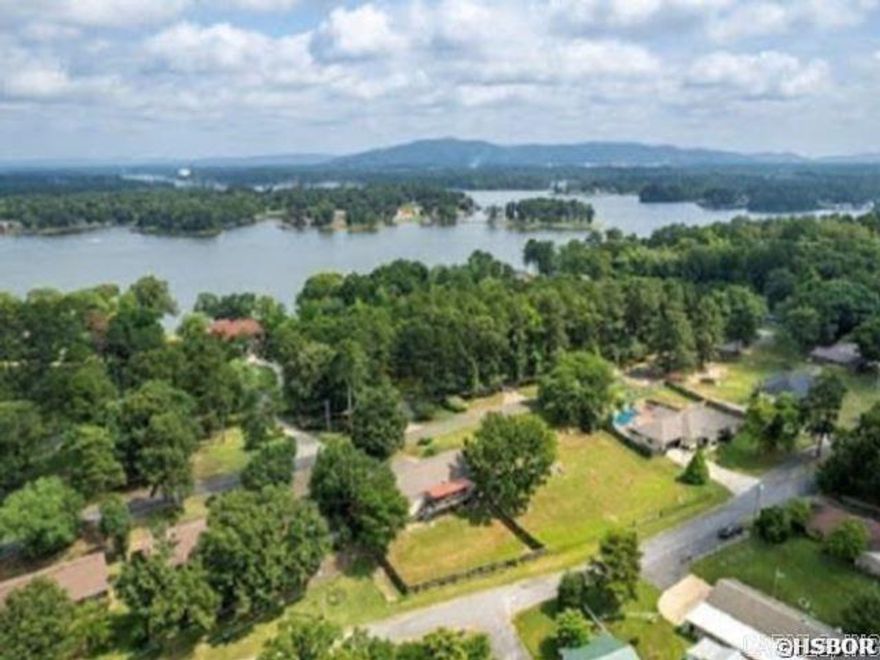 Ready-to-build lot in 7 South Hot Springs!  Enjoy the beautiful Lake Hamilton view from your front porch along with the tranquil setting.  Lot is cleared and all utilities at street.  Rear access from Lorelei Circle.  This is a great opportunity you do not want to miss, whether you are building for yourself or are a developer looking for your next project!