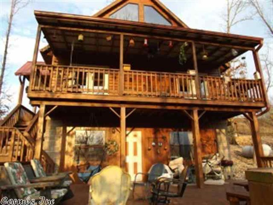 The seller's call this cabin Mountain Breeze for good reason. High on the ridge and with seasonal views of S. Sylamore Creek valley, the windchimes sing. It is about a 10 minute hwy drive to town center.Custom built with many local woods, this ample size cabin is a great getaway from the rat race or a family home. With three levels there is space for everyone to find their own cozy spot.So important to life in Mountain View, there are vast amounts of outdoor seating areas. 2 bedrooms, 1 bath on main level,