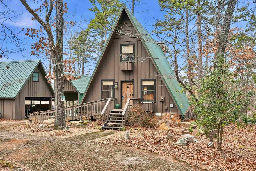 When you think "Lake-House", A-Frames are a nostalgic design that comes to mind.This A-Frame is so cozy, has a wood burning fireplace, LAKEFRONT (with White Line in the water, so more trees can be cut to open the view up even more), Lake Views from the cabin & decks, plus steps down to the water. For many years the cabin has been setup to be used as a 3 bedroom (1 Bedroom upstairs above the kitchen w/full bathroom on main level, Primary bedroom downstairs w/a full bathroom & laundry room connected, & 3rd bedroom setup downstairs as well w/walk-out basement onto the lower patio. There is a large room above carport that would make a great Bunkroom/gameroom/craftroom/guest quarters,etc. The home was built in 1988, but Remodeled w/all new LVP flooring throughout the home around 2021,new roof/gutters in 2018,pull blinds installed May 2024,all new kitchen appliances, countertops & cabinets in July 2024, & High-Speed Internet through "Connect 2 First".  Community Boat Ramp & Private Airstrip for property owners in "Skypoint Estates". Option to purchase extra lot across the street for additional $15,000 (Lot 18).  See Virtual Tour Website to view videos, house layout , & walk through tour.