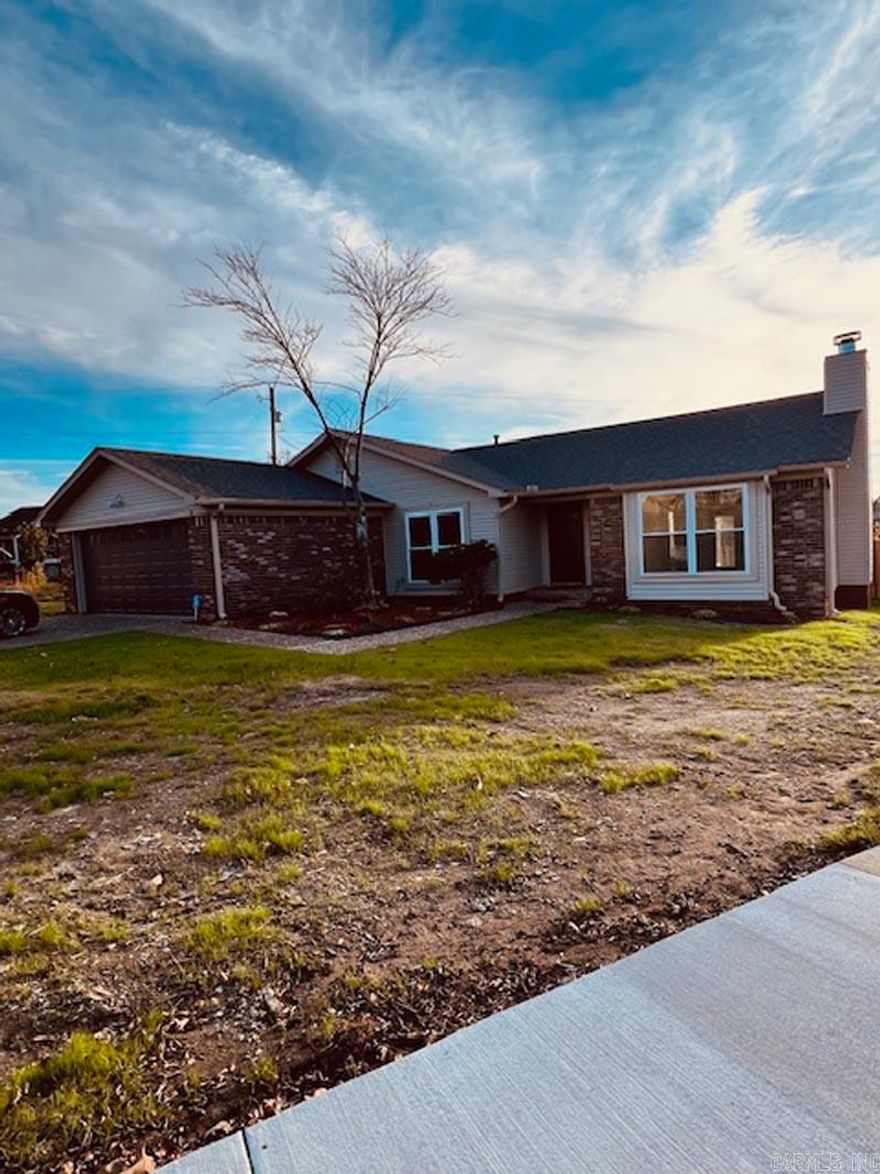 PRICED TO SELL - In the heart of West Little Rock off of Old Forge Road.  All new vinyl exterior, brand new electrical breaker box & breakers, all new low e windows, new sliding glass door off of Sunroom, new back door, new covered and uncovered deck, NEW Roof, new insulation in attic, new fenced in back yard.  Interior has all new paint, all new flooring, kitchen has new sink, faucet, granite countertops, moveable island in kitchen has new countertop & granite on built-in china cabinet in dining room & in laundry room. A/C is three years old and heater serviced for the winter. New blinds throughout the house. All improvements made after the March storm.  AGENTS SEE REMARKS.