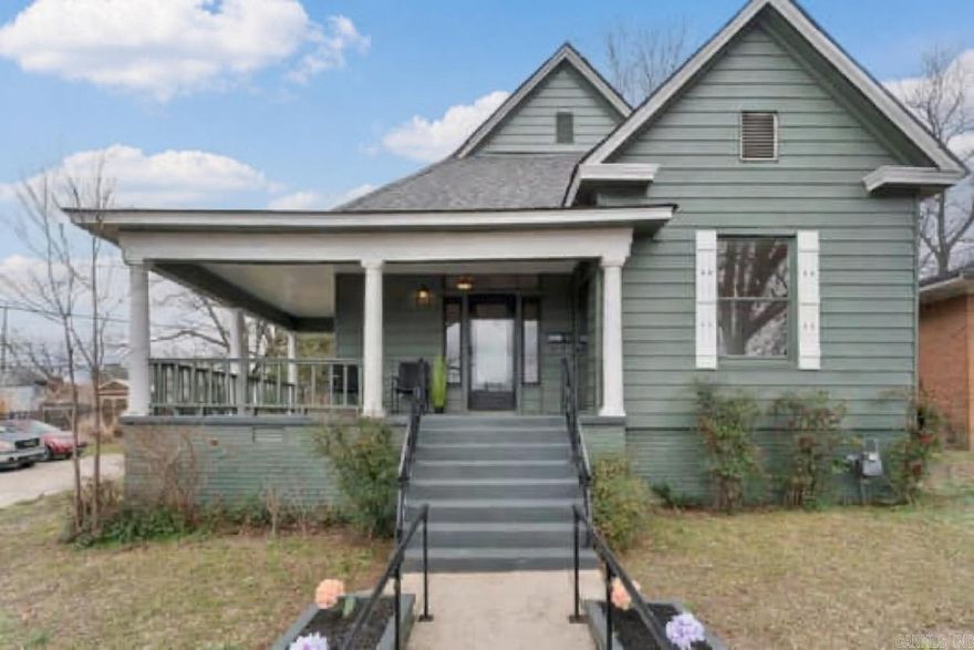Discover timeless charm in this meticulously remodeled 1940’s Craftsman home—a perfect blend of vintage appeal and modern updates in the heart of Little Rock! Relax on the spacious front porch with morning coffee or summer BBQs. Inside, tall ceilings, refinished original hardwood floors, and abundant windows fill the space with natural light and warmth.  The flexible layout flows seamlessly: front guest bedroom/office, generous living room for any furniture setup, versatile formal dining (ideal as primary suite alternative), front guest bath for convenience, and private bath toward the back. Enjoy extra storage in the separate laundry room plus another guest bedroom/office for endless options. The spacious kitchen delights with ample cabinets, granite countertops, farmhouse sink, and room for a cozy breakfast nook.  Private backyard parking includes covered parking pad. Major recent updates: new floors, roof, HVAC, kitchen, bathrooms—truly move-in ready! Prime spot minutes from UAMS, Children’s Hospital, and Downtown Little Rock.   *Qualifies for Down Payment Assistance/Grants via select banks! Seller offers $4,000 toward buyer’s closing costs. Floorplan in pics! Agents See Remarks