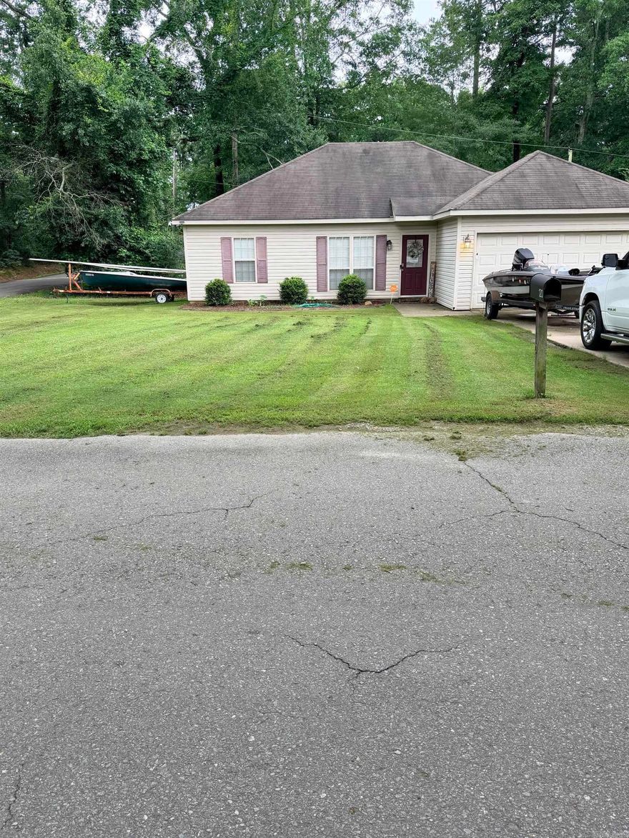 Great large corner lot within a half mile to school and neighborhood lake and park. Large living room with vaulted ceiling open to dining and Kitchen. Large kitchen with new stove and dishwasher. Split bedroom plan with large master and on suite bath with walk in closet. Fenced back yard with a deck off the kitchen. The area is seeing new homes being built.