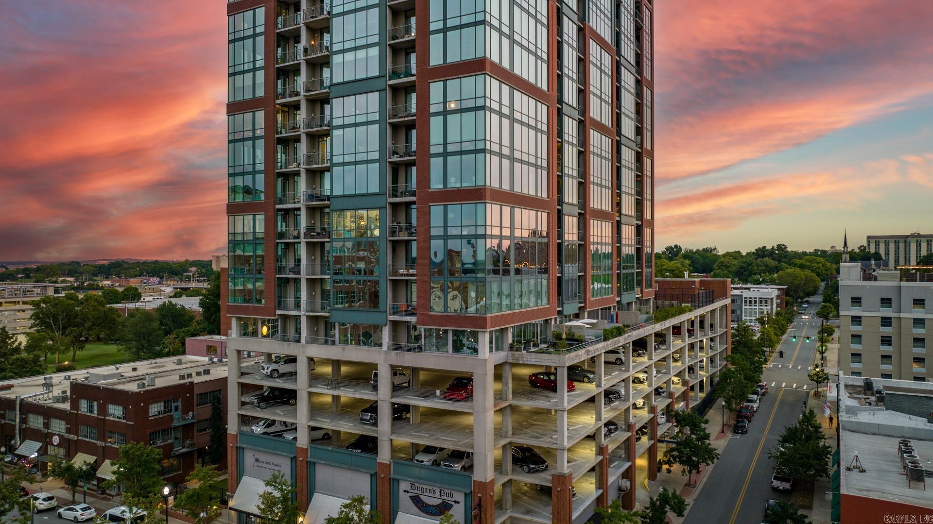 Stunning 13th floor corner unit at River Market Tower. Panoramic SW views of Little Rock's skyline, state capital and river. Updates include new remote-controlled blinds, new carpet in bedrooms, new pantry, fresh paint, and more. All appliances convey plus two premium parking spaces. Building amenities include a beautiful pool and garden, grill and firepit area, 20th floor party room, basketball and pickleball courts, a newly updated fitness room, concierge, pet area and impressive new lobby coming soon in 2025!