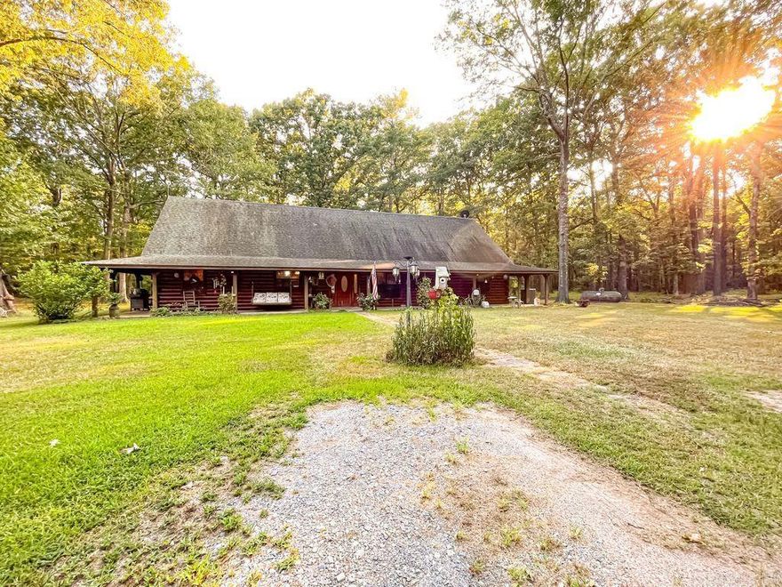 Enjoy peace, privacy, and natural beauty in this beautiful 3-bedroom, 2 bathroom log cabin set on 13.45 acres. This homes features a large kitchen, spacious living room, and an open loft perfect for extra living space or a home office. Enjoy watching wild turkey and deer roam the property from your back porch! Outside, two 20x30 shops with a connecting awning providing ample space for storage, hobbies, or a workshop. A full home generator ensure year-round comfort and reliability- if you are looking for something outside of town this the home for you!