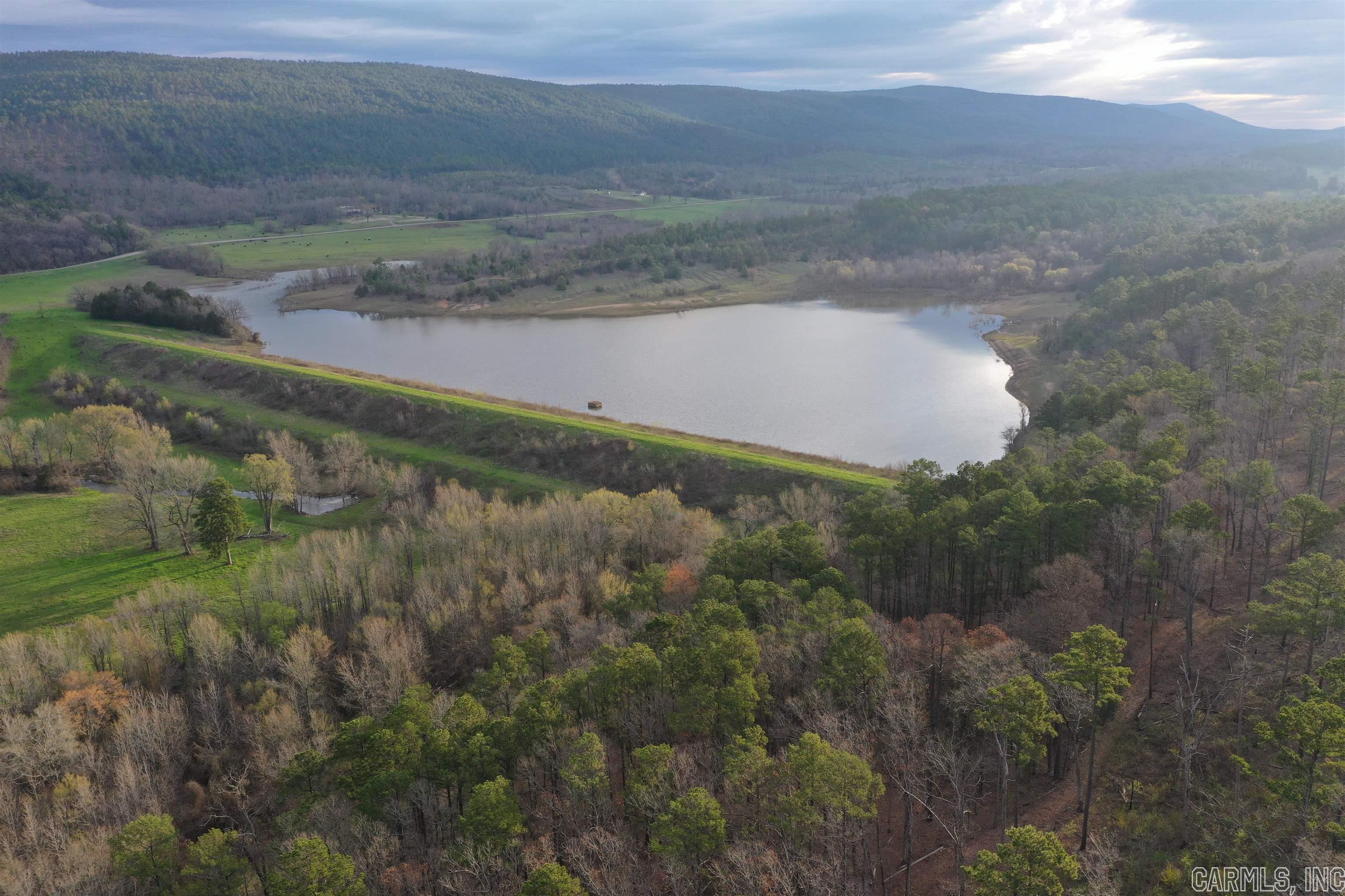 ⢠303 +/- Acres ⢠25 +/- Acre Private Lake ⢠1.75 Miles of Ouachita National Forest Boundary ⢠Highway 248 Frontage ⢠Power and Water available ⢠Two Smaller Ponds ⢠Excellent Five Strand Barbed Wire fencing ⢠Lush Pastures ⢠Hay Meadows ⢠Abundance of Deer and Turkey ⢠10 Minutes from Waldron ⢠1 Hour from Fort Smith