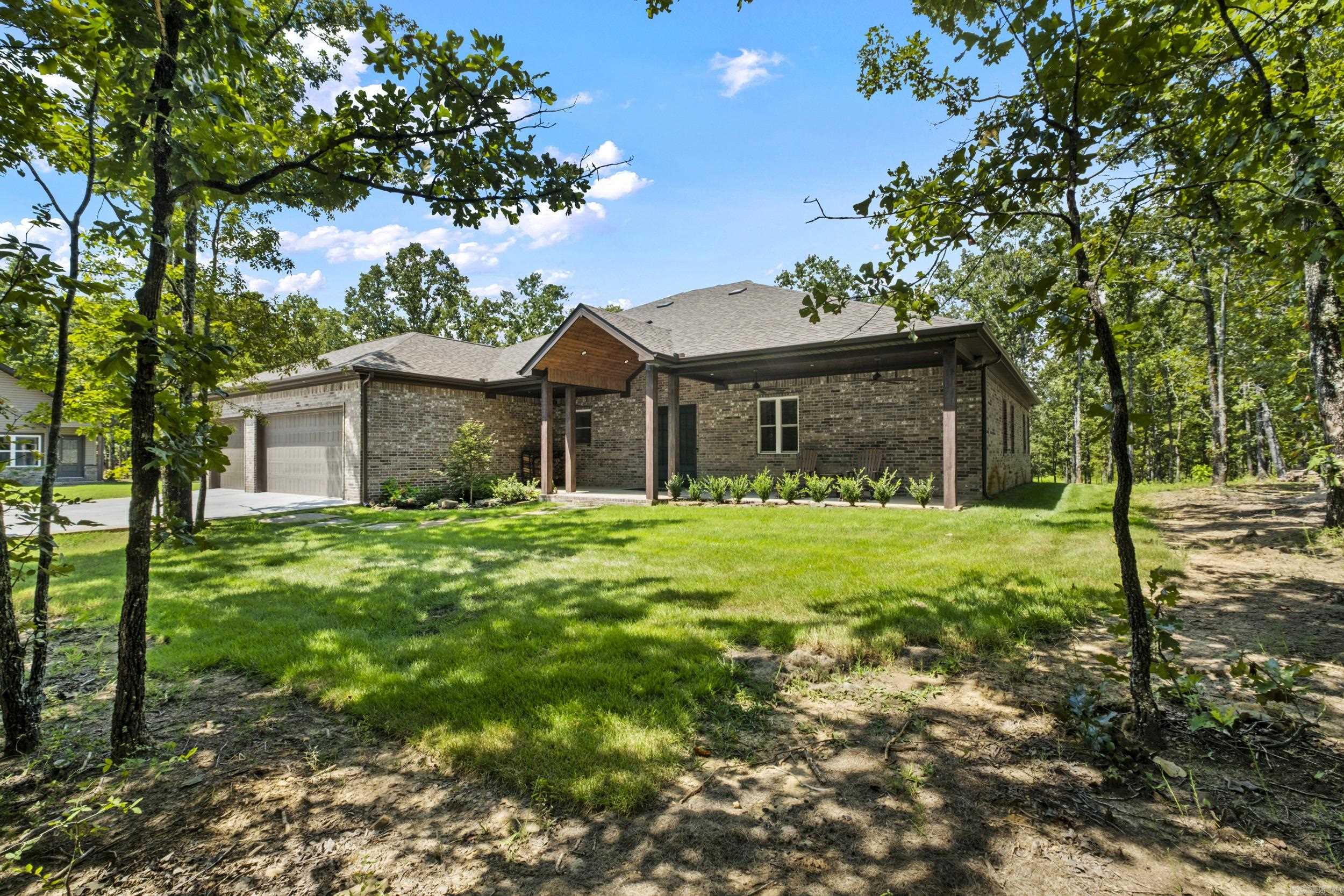 Custom Secluded Oasis on 24 acres. House, Guest house, Huge barn, Pond, some land cleared for livestock, some land still wooded for wildlife. Beyond the security gate you'll find the main house at 2977sqft. 3bed, 2bath, split floor plan with a chefs kitchen and office that could be 4th bedroom. Custom kitchen boasts high end stainless steel appliances and more storage than most could ever fill up. Both a walk in pantry as well as a second pantry cabinet. 10ft ceilings throughout with 8ft doors. The covered back porch has commercial grade remote controlled blinds that make the space usable all year long. The guest house is half RV garage and half apartment. The 580sqft apartment has the same level of finishes as the main house. Living room, kitchen, bathroom, and bedroom make a great space for guests, a teenager, or parents that you want to keep close by. This property has too many features to put in a listing description but a few more include; Wood burning stove, hidden safe room, 3car garage, hail resistant roof, Pella windows and doors throughout, and the list goes on. Oh and the custom chicken coop stays! Agents see remarks.