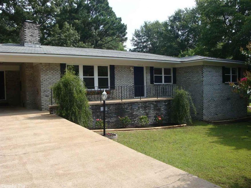 This house has been made like new.  New kitchen cabinets and appliances, new water heater, new walls, new windows, new flooring, new paint, new baths. He added can lights in kitchen and above fireplace. He did all new plumbing under the house and into the baths.  It looks like a new house inside. Fireplace, 4 bedrooms, large storage room at end of carport.  Size is taken from appraisal but measuring is welcomed.